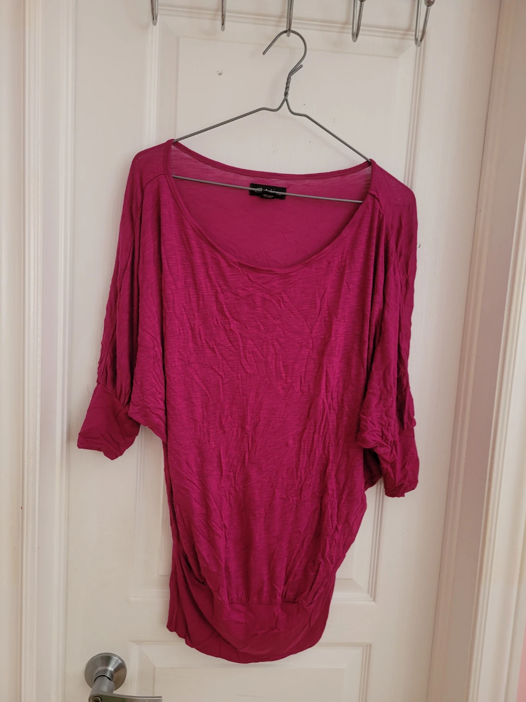 Pink dolman sleeve top