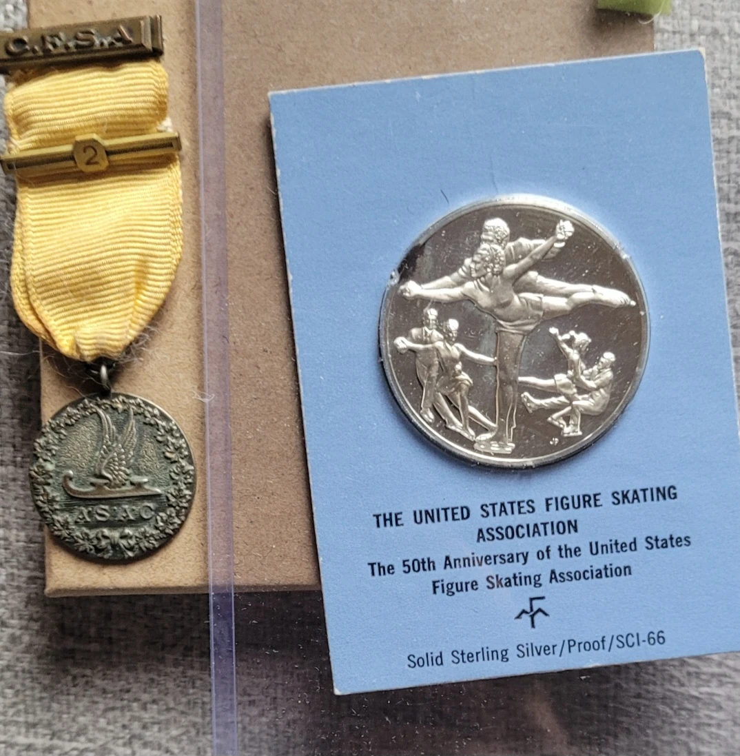 Sterling birks skating and sterling medal