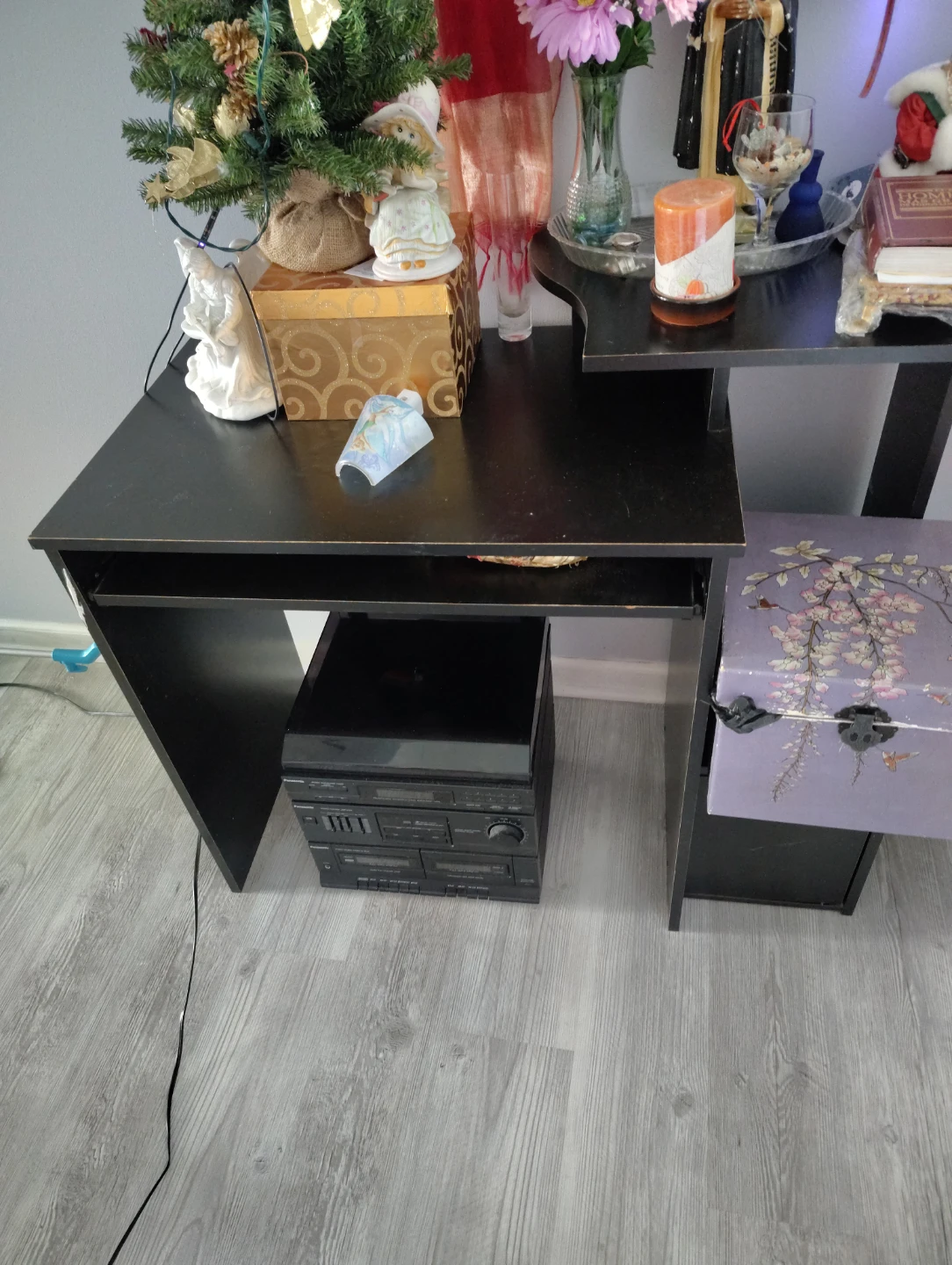 Black stereo system with CD player and dual cassette deck