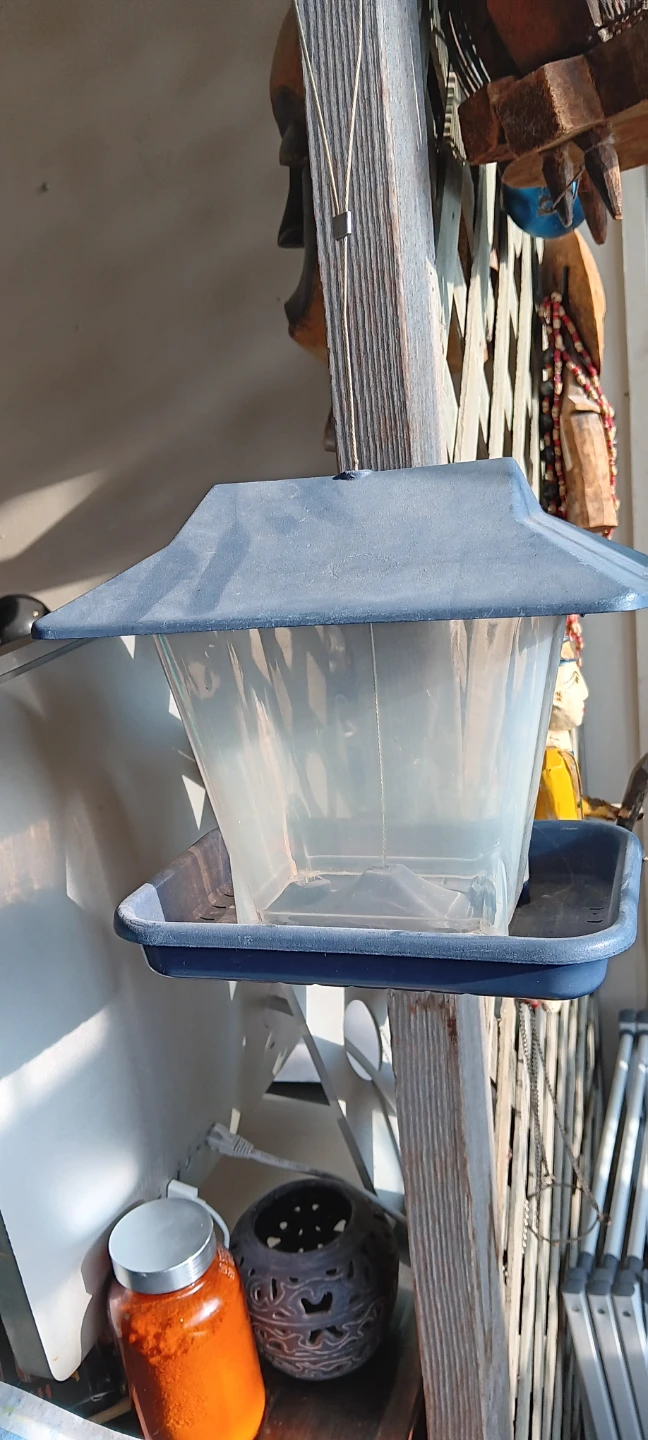 Plastic bird feeder