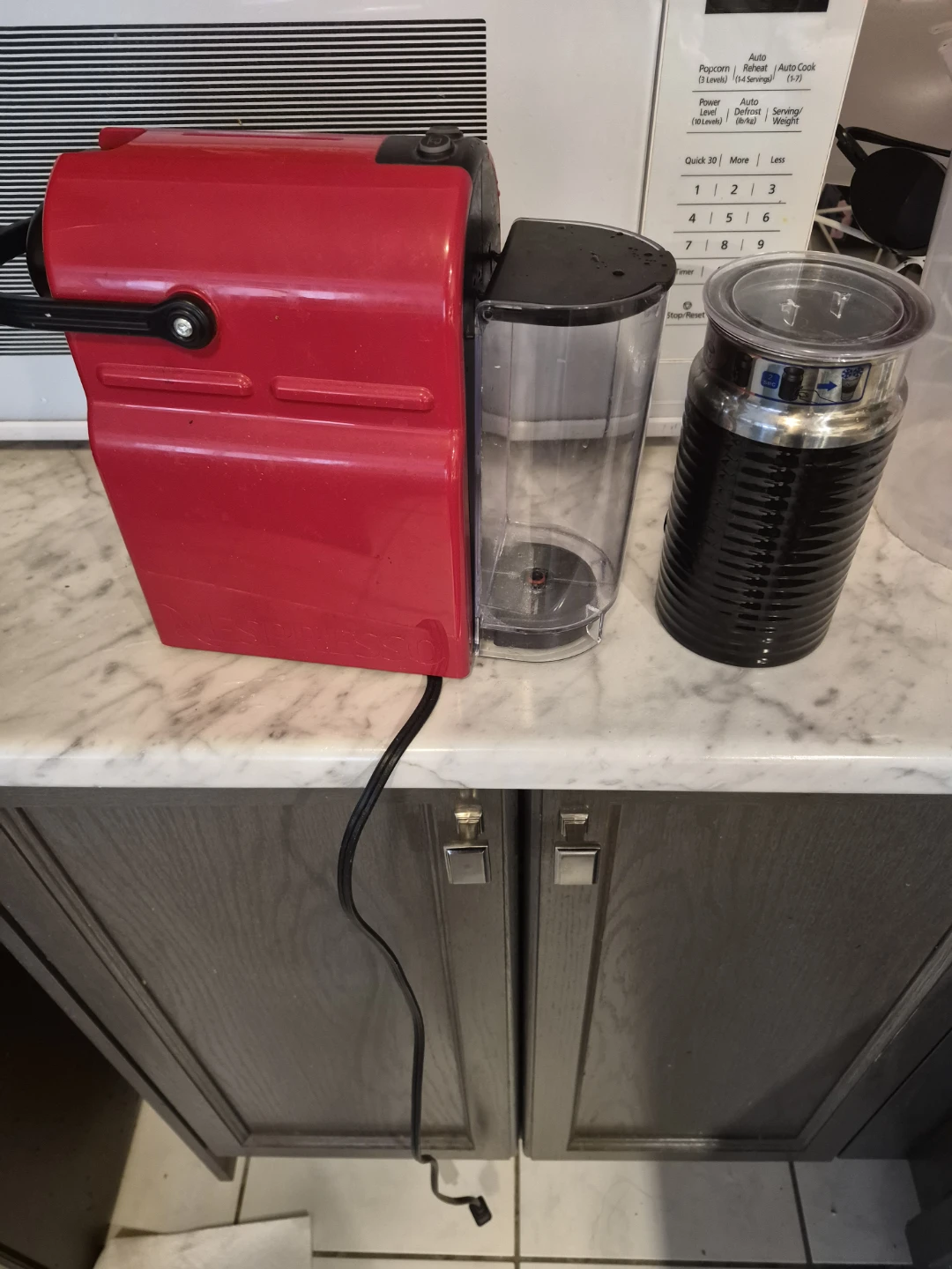 Red Nespresso Coffee Machine