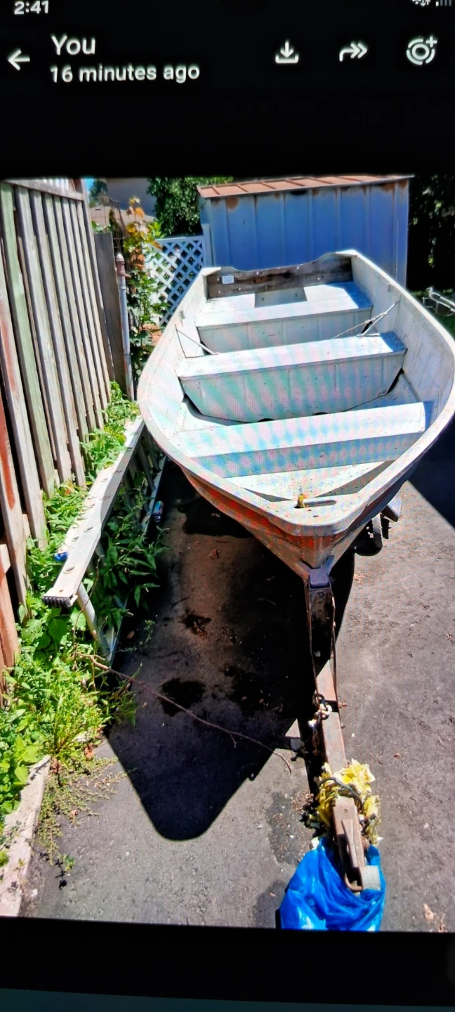 Aluminum fishing boat with Mercury outboard motor