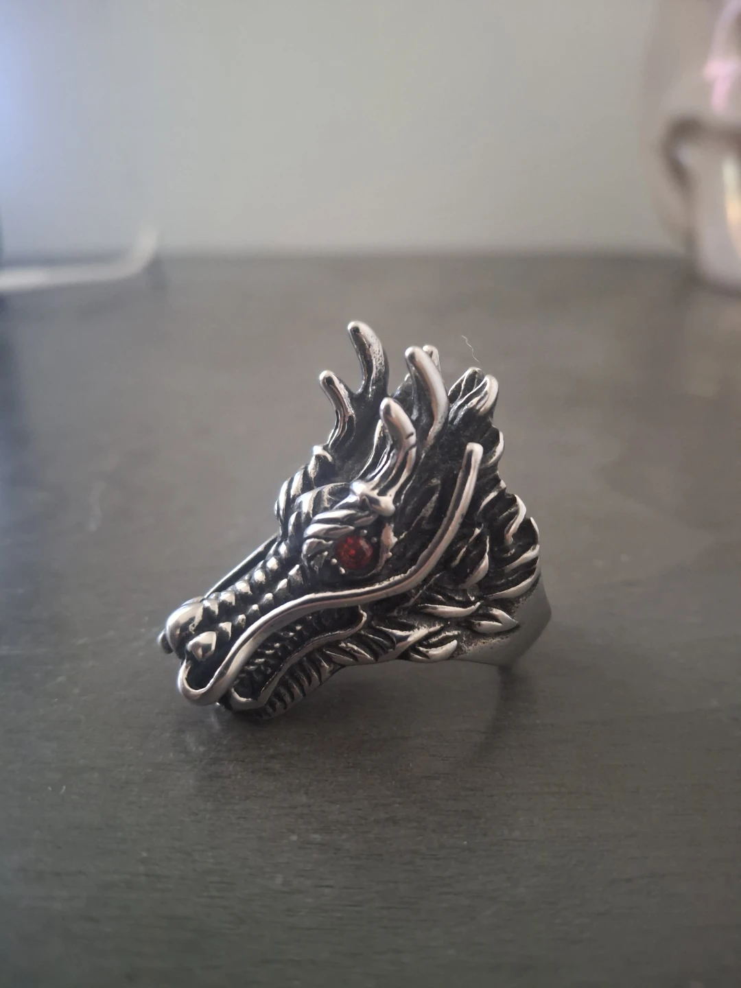 Silver dragon ring with red eye