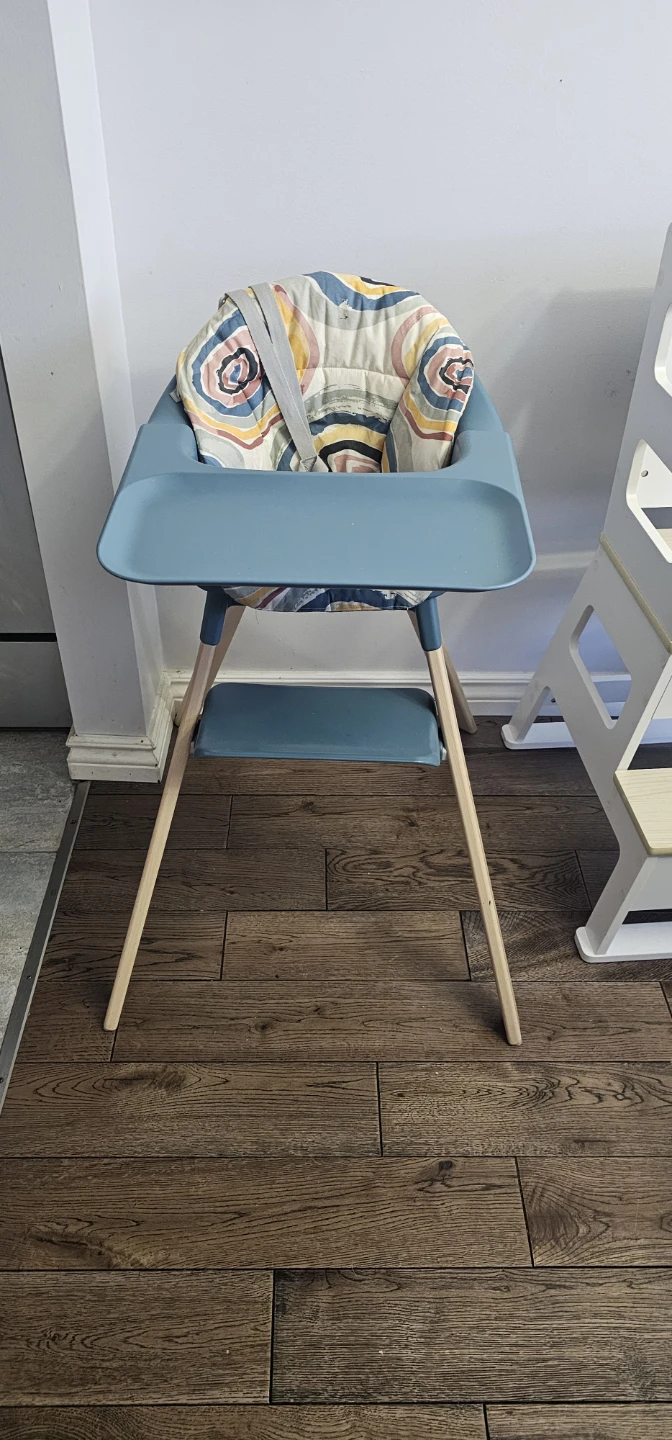 Stylish Blue High Chair with Patterned Seat Pad