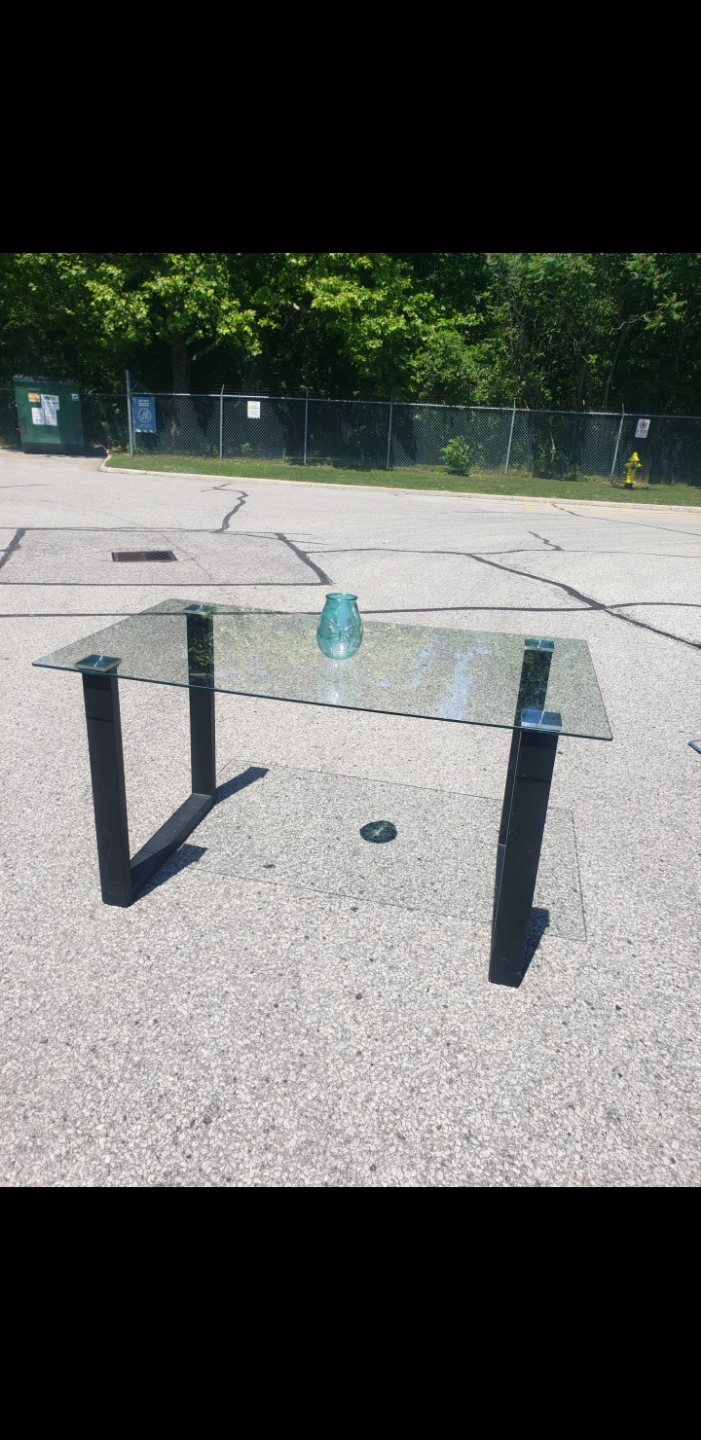 Glas table with black metal legs