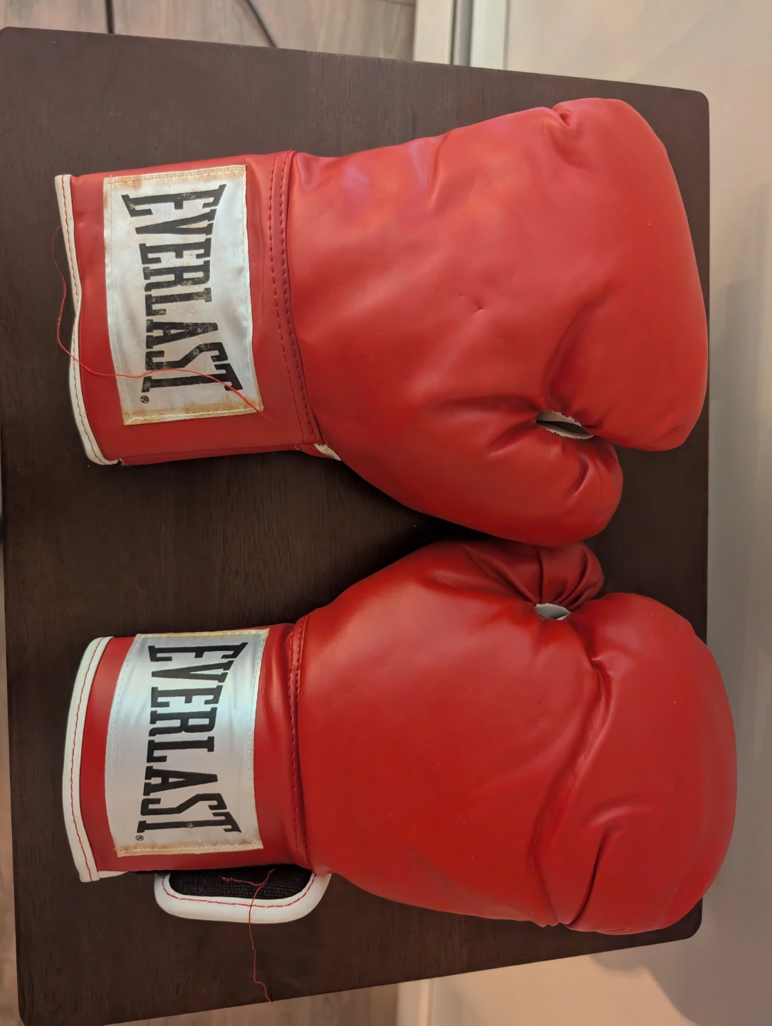 Two sets of Everlast Training Gloves with  punch mitts