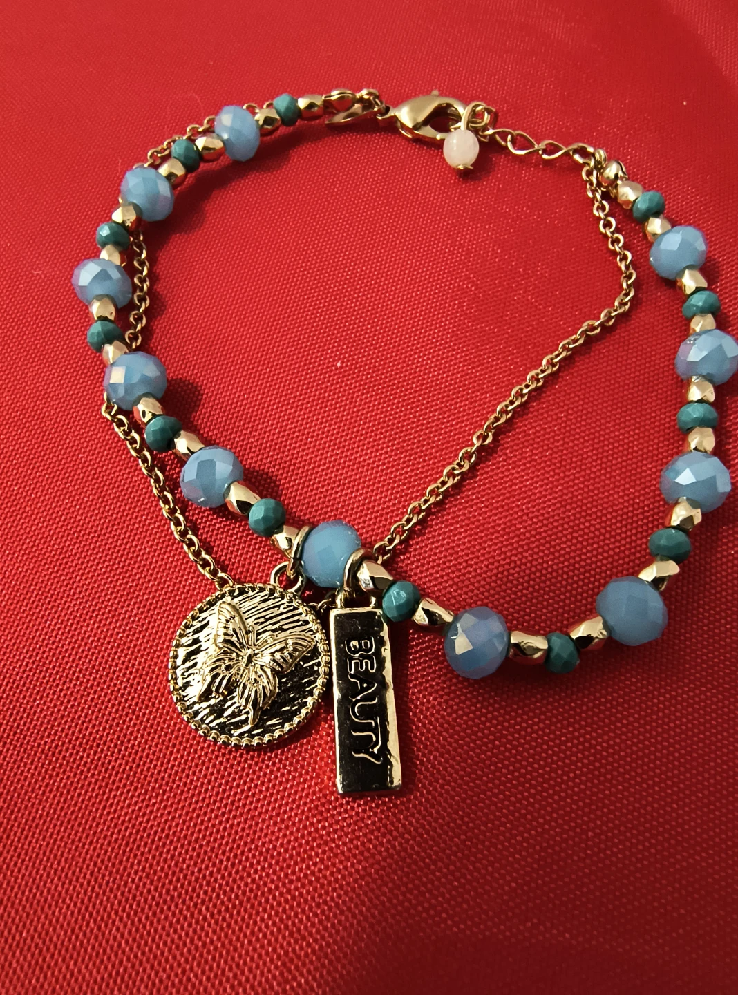 Gold Beaded Charm Bracelet with Butterfly and Beauty Bar