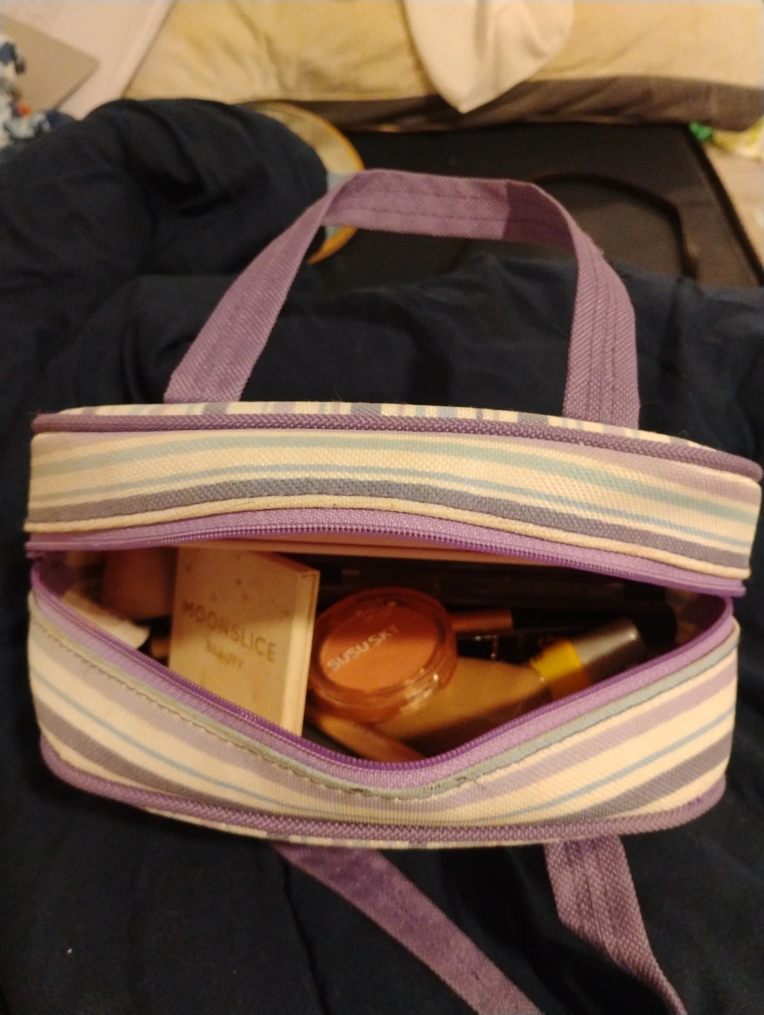 Moonslice Beauty and Covergirl makeup set with bag