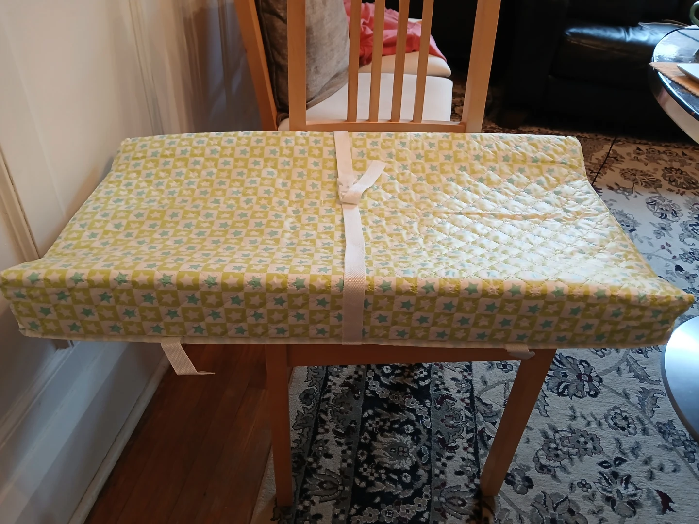 Change pad with safety strap