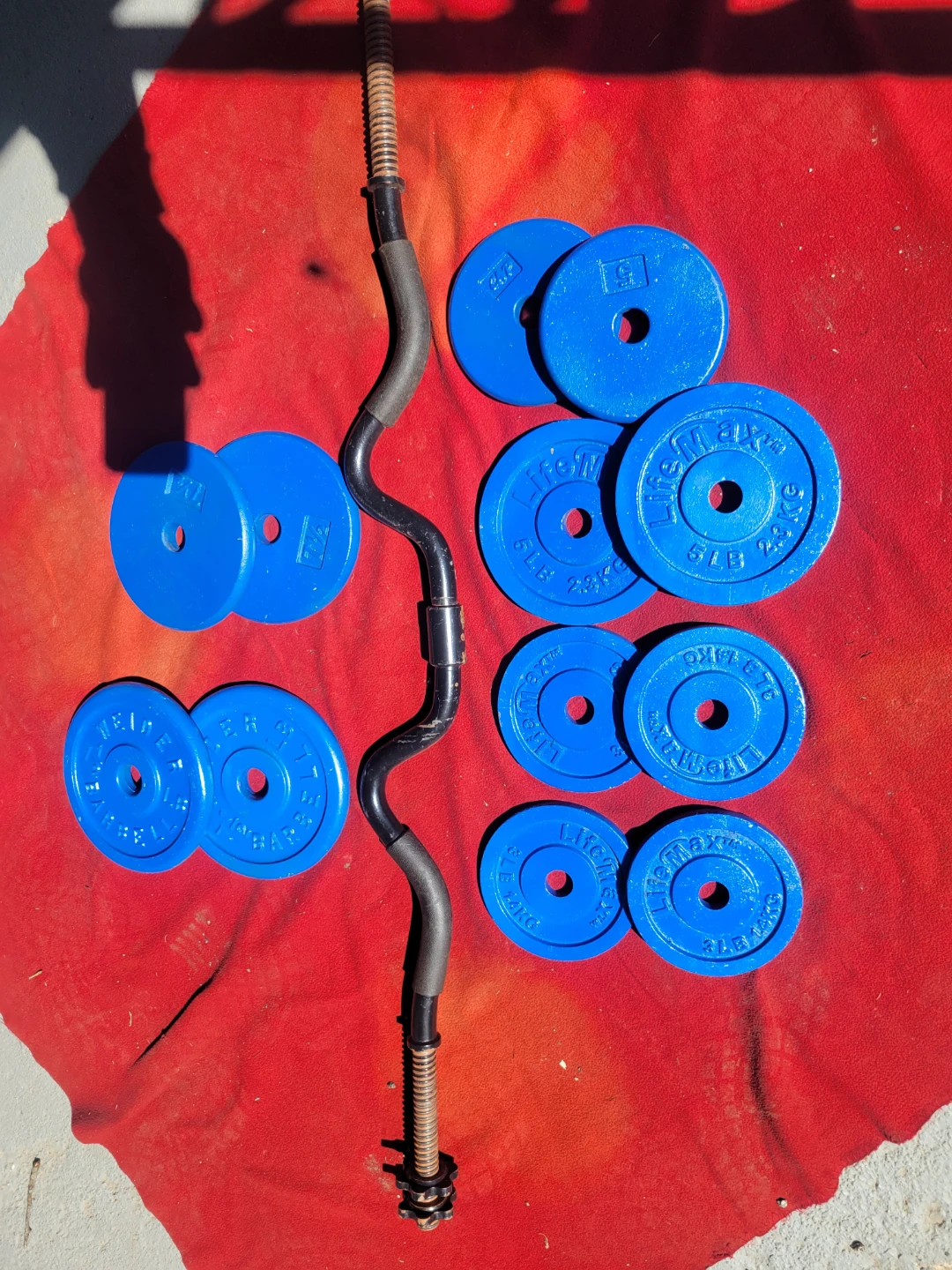 1" HOLE  EZ-CURL BAR AND 62LBs. - photo 2
