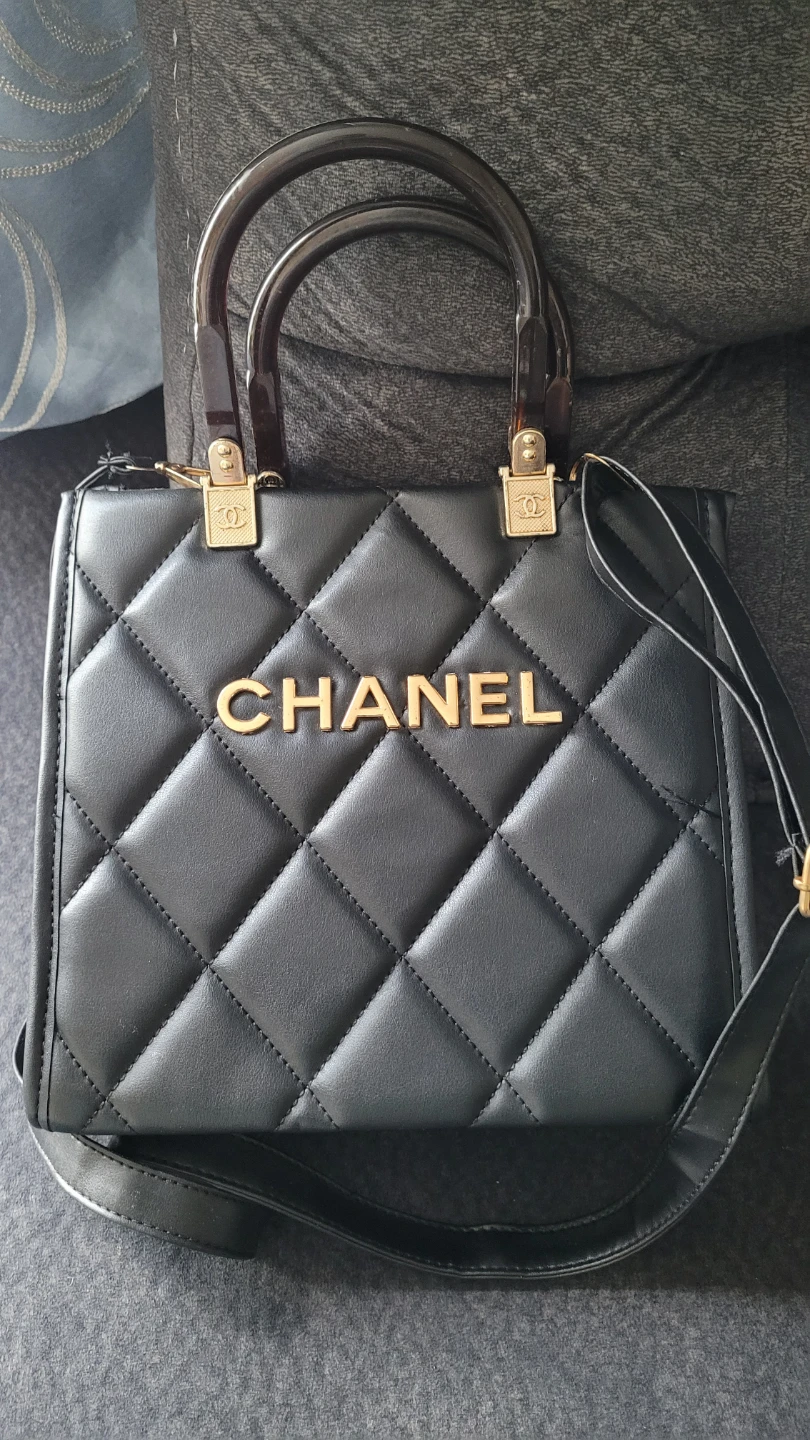 Black Quilted Handbag with CHANEL Logo
