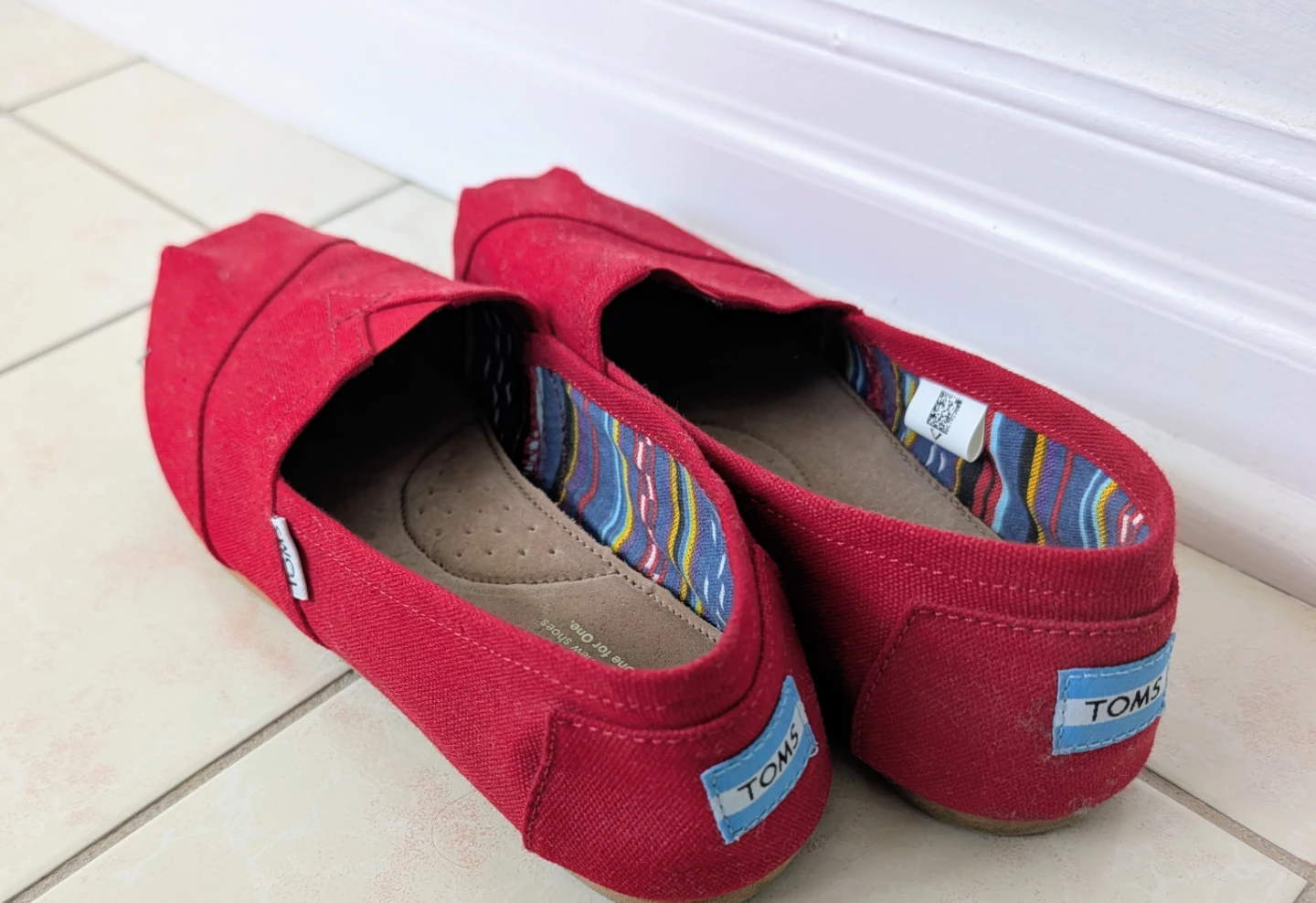 TOMS Red Canvas Slip-On Shoes (size 10)
