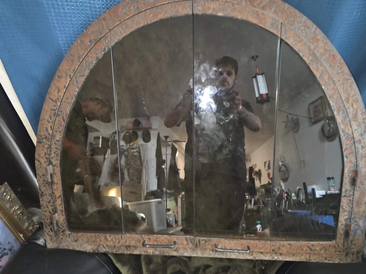 Curved Mirrored Cabinet with Wood Trim