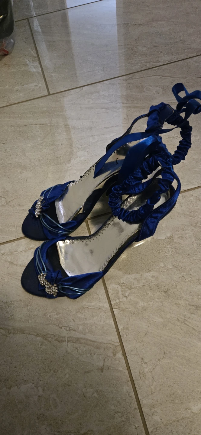 Blue strappy heels with rhinestones
