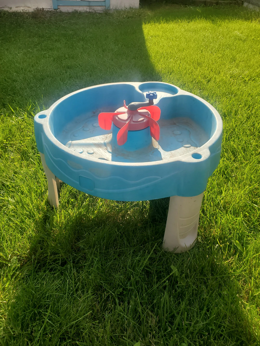 Blue Water Table with Red Spinner