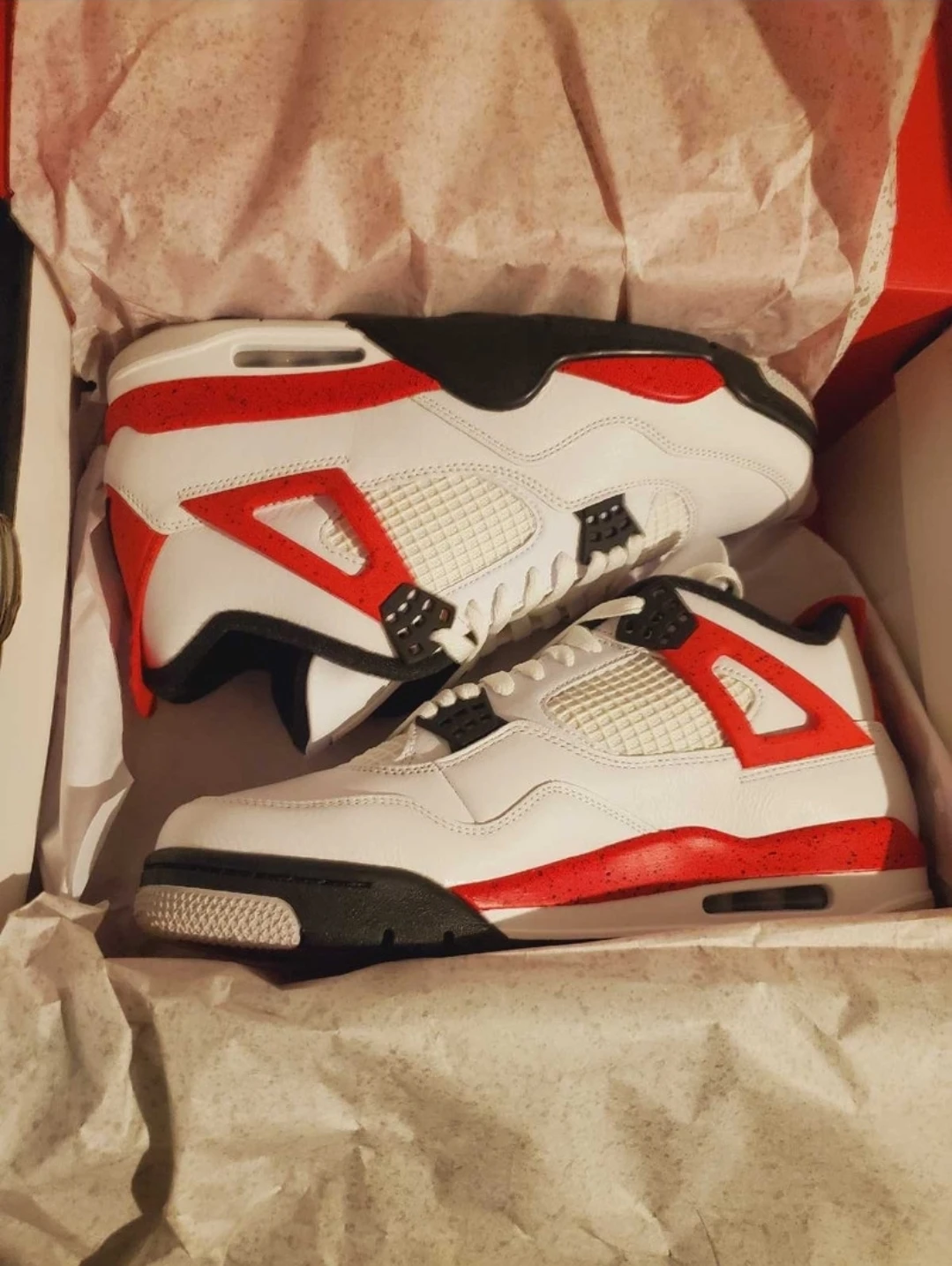 Jordan 4s "red cement"