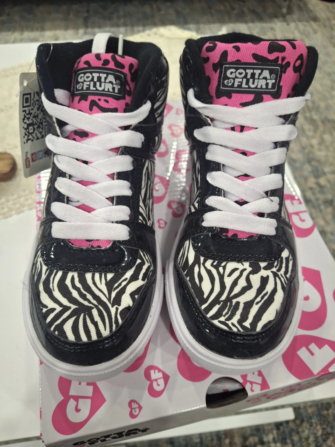 Gotta Flurt zebra print high top sneakers