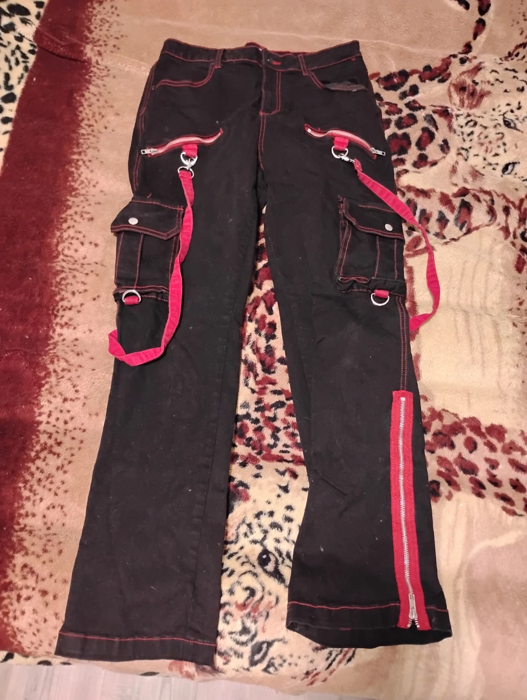 Black cargo pants with red accents