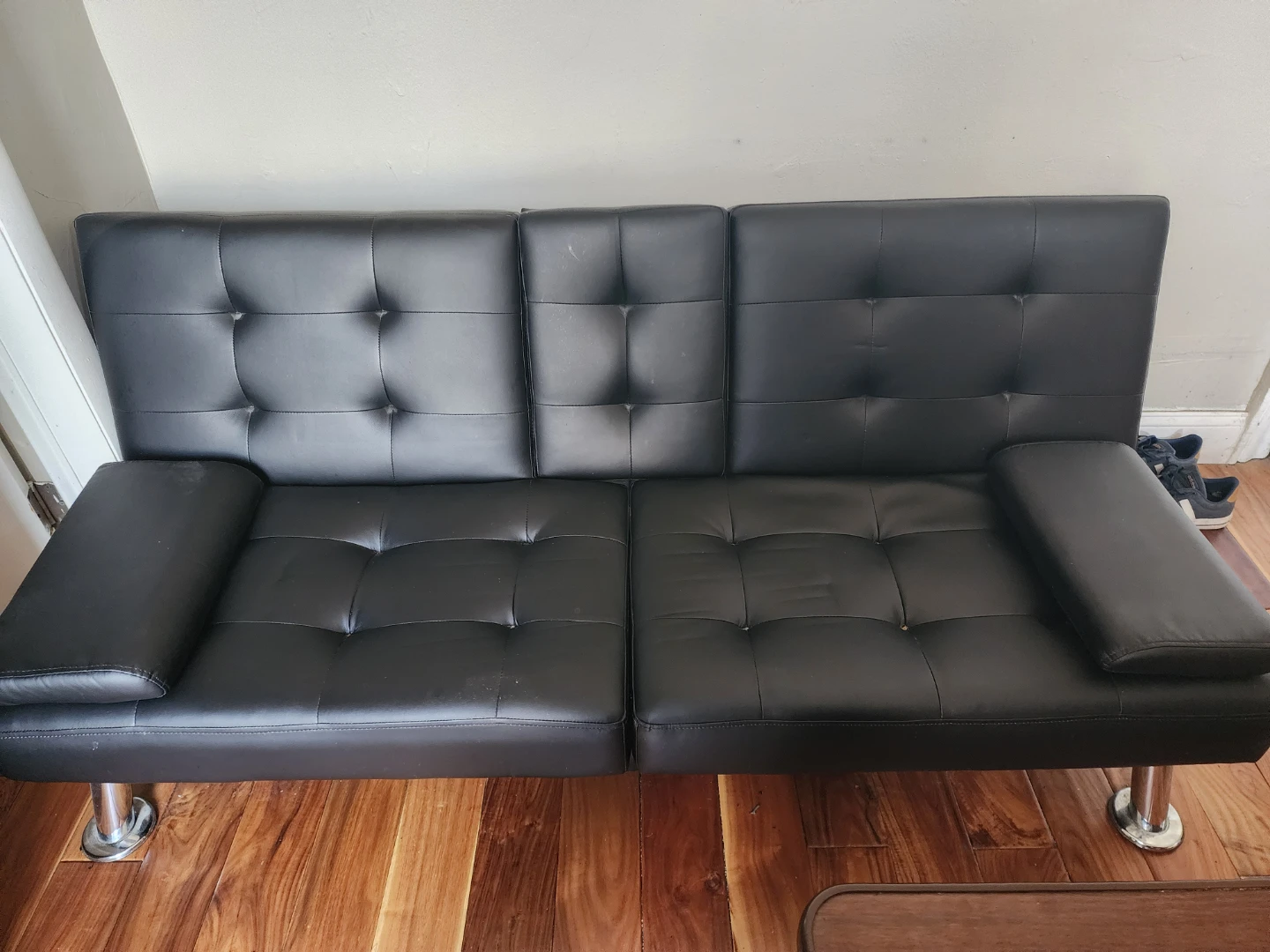 Black Faux Leather Loveseat Futon with Cup Holders