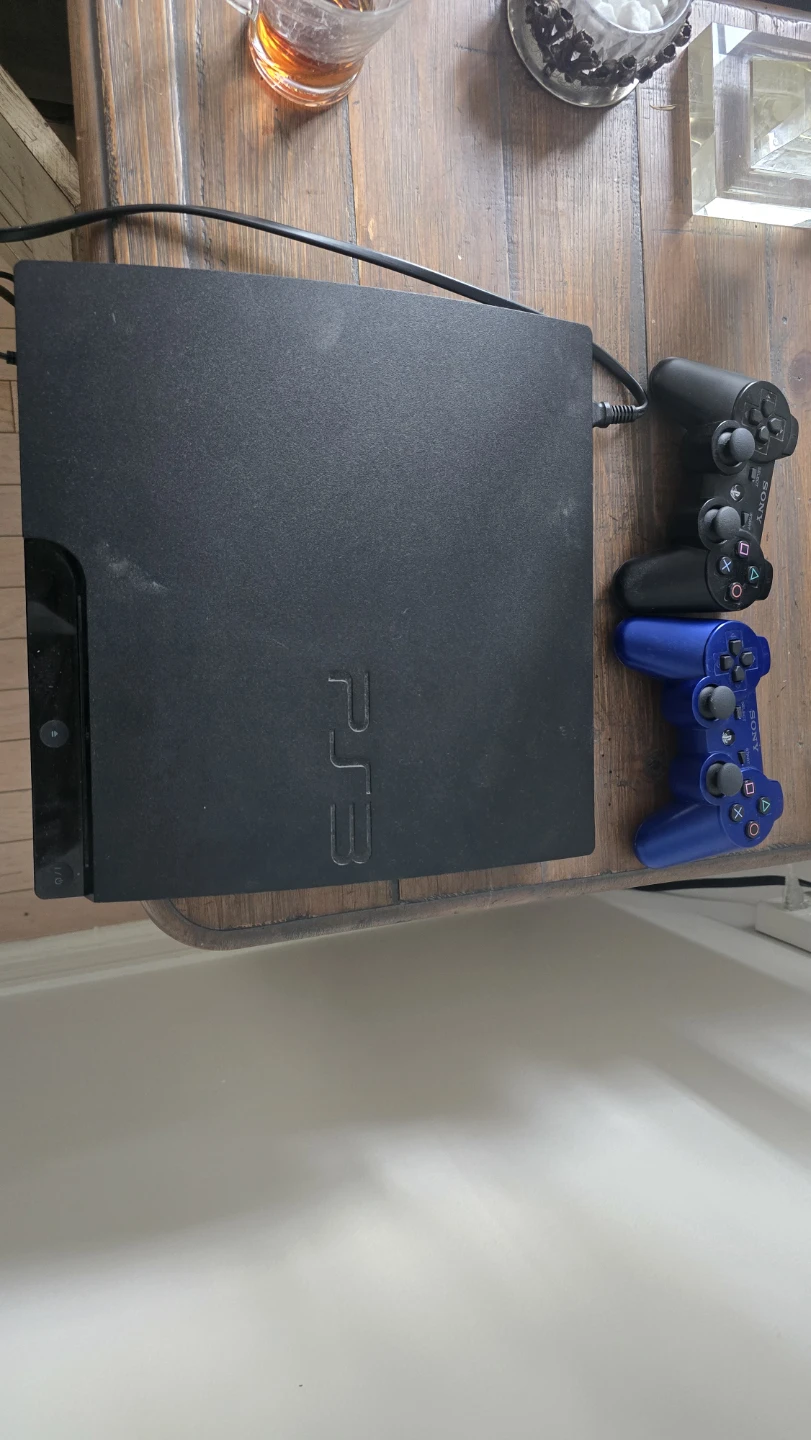 Sony PlayStation 3 Console with 2 Controllers - photo 3