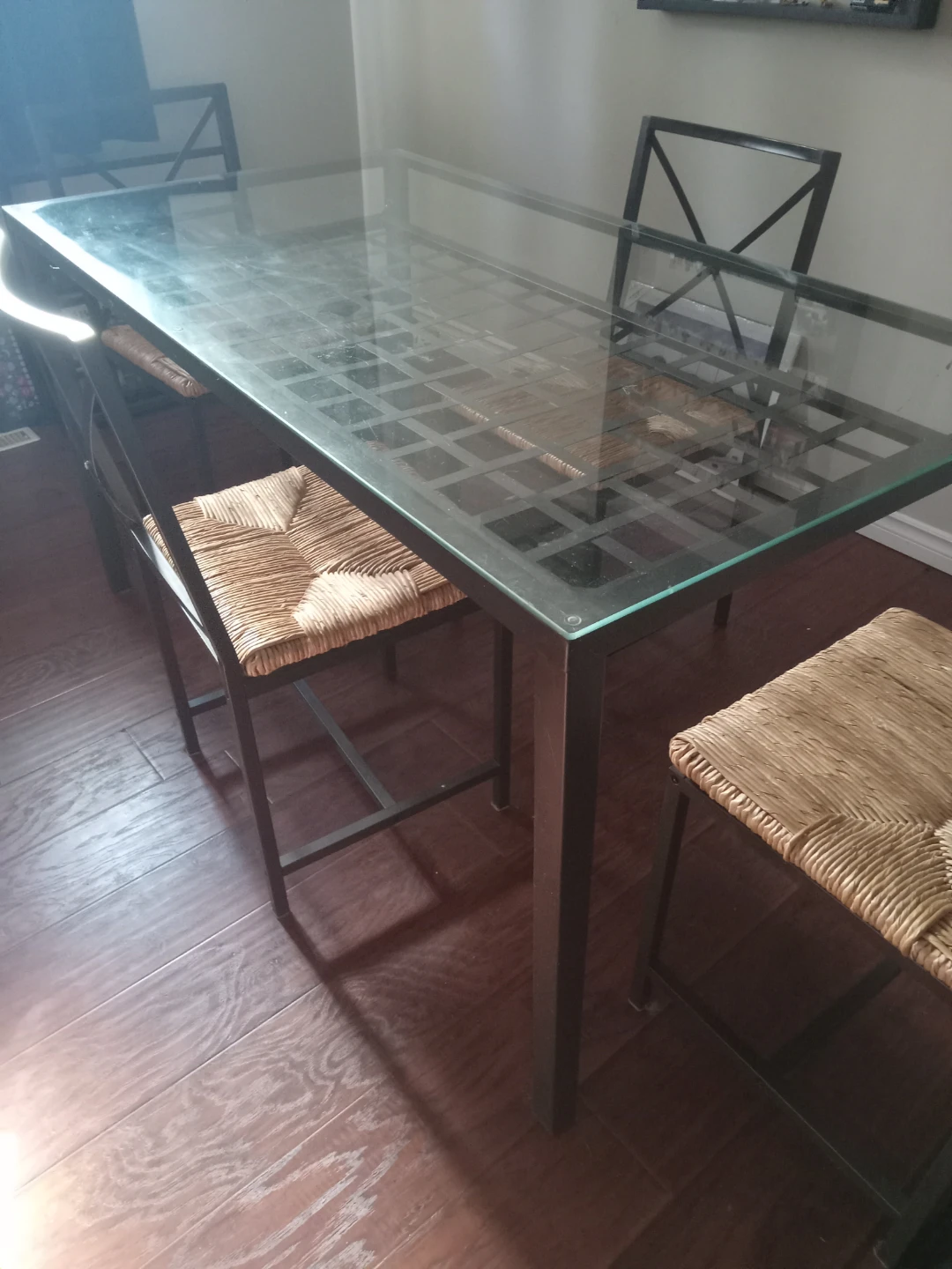 Glass Top Dining Table with Woven Seat Chairs