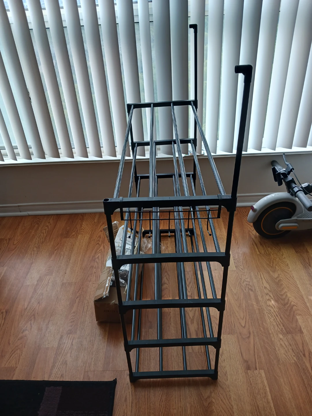Black 4-tier shoe rack - photo 4