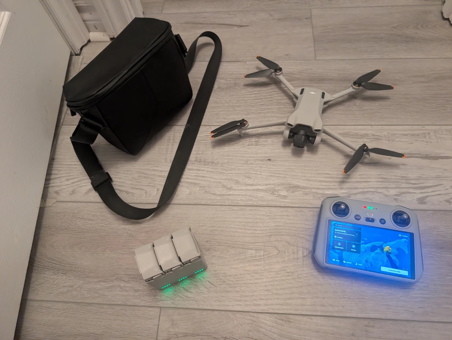 DJI Mini 3 Drone w/ remote control, 3 batteries, & bag