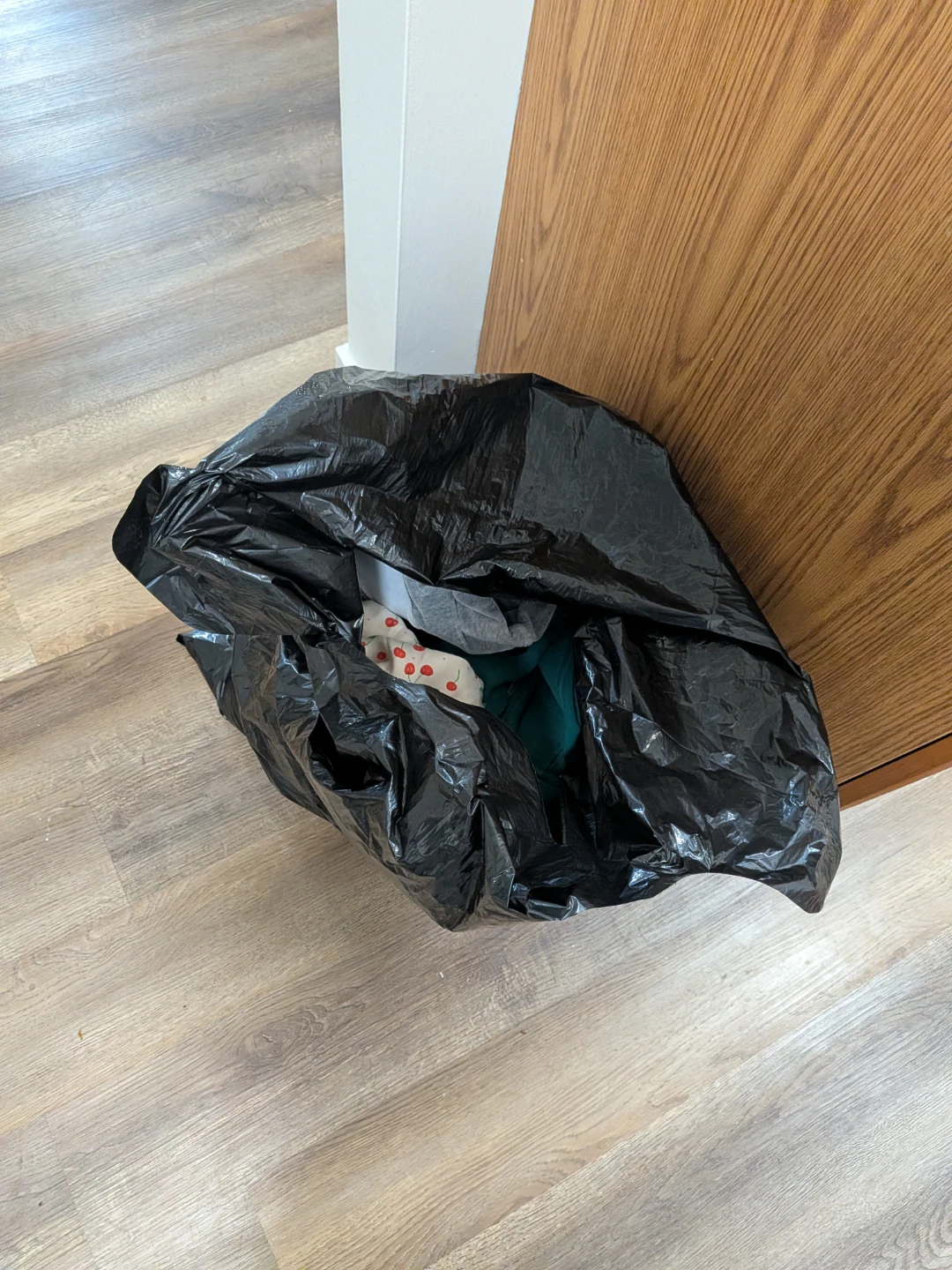 Bag of assorted clothing items
