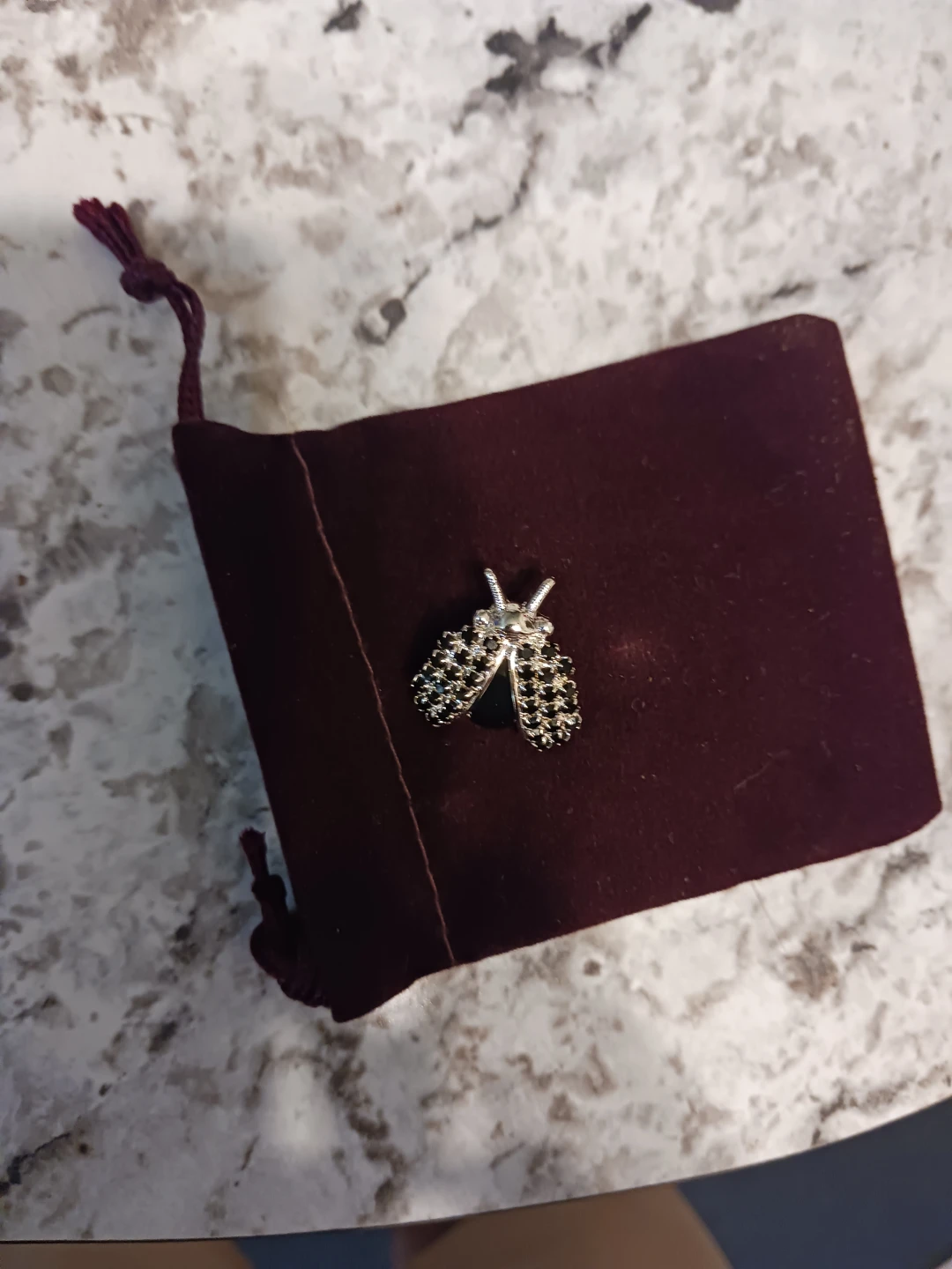 Silver tone butterfly brooch with black accents - photo 2
