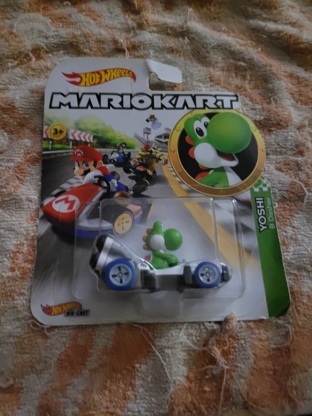 Hot Wheels Mario Kart Yoshi B-Dasher die-cast vehicle.