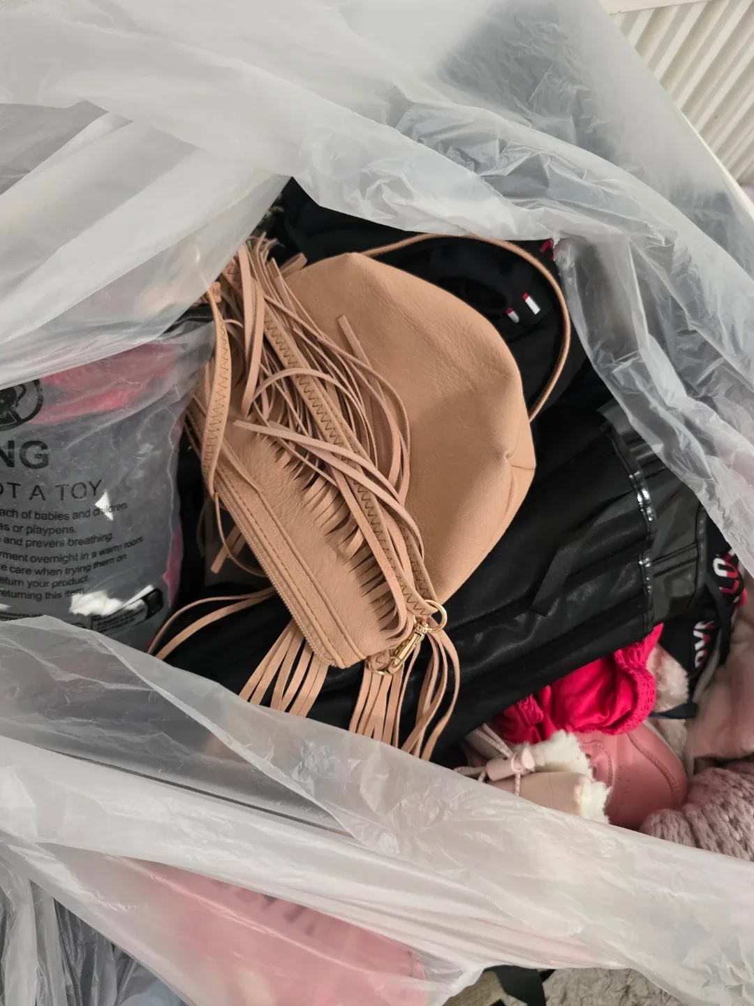 Bag of assorted women's clothing and accessories