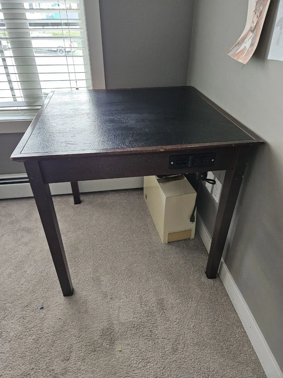 Dark wood desk with built-in power outlets - photo 3