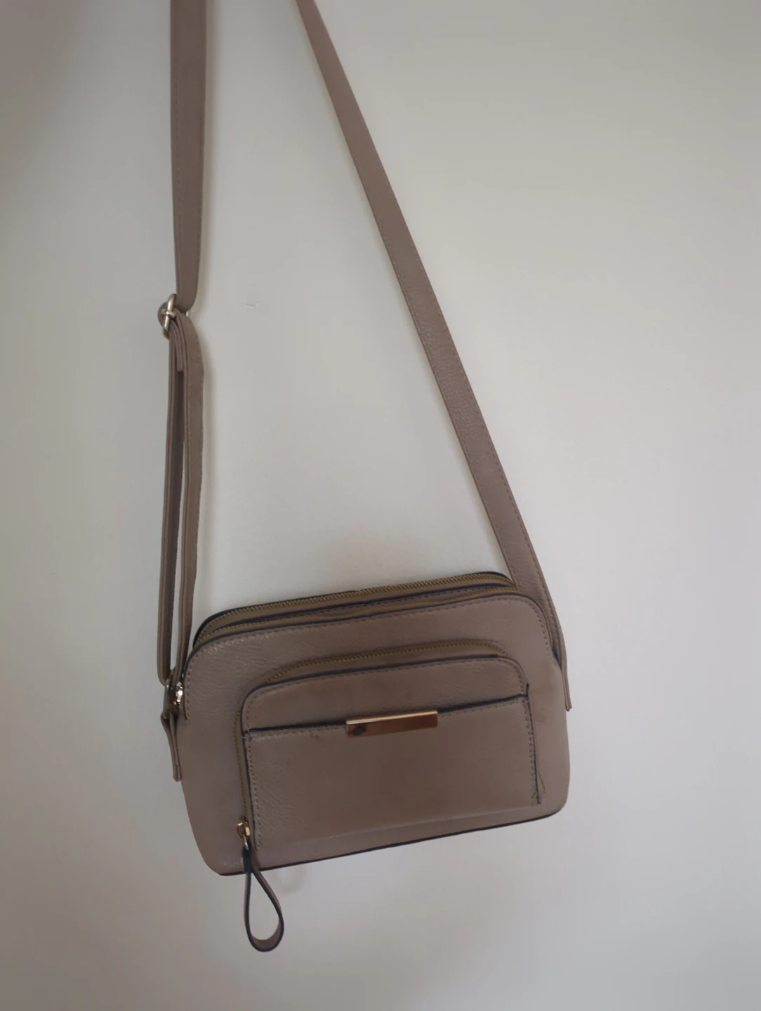 Beige multi-compartment crossbody bag