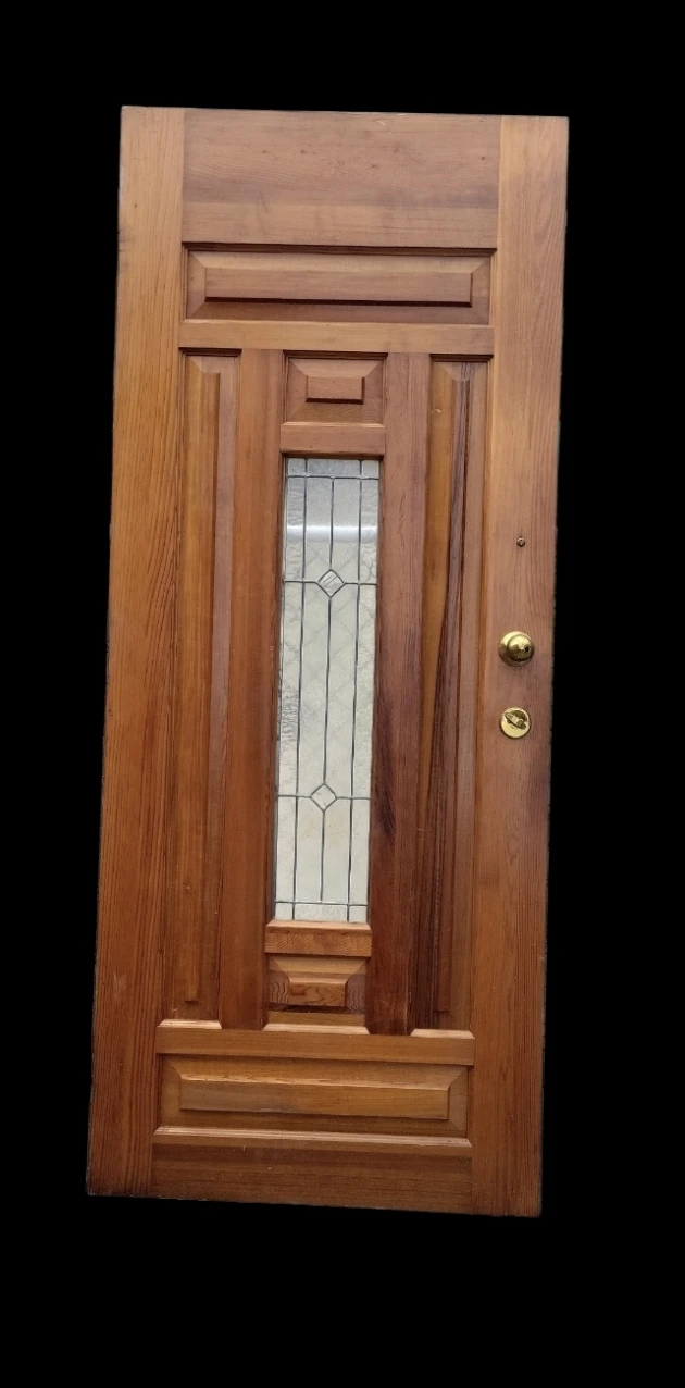 Wooden door with glass insert