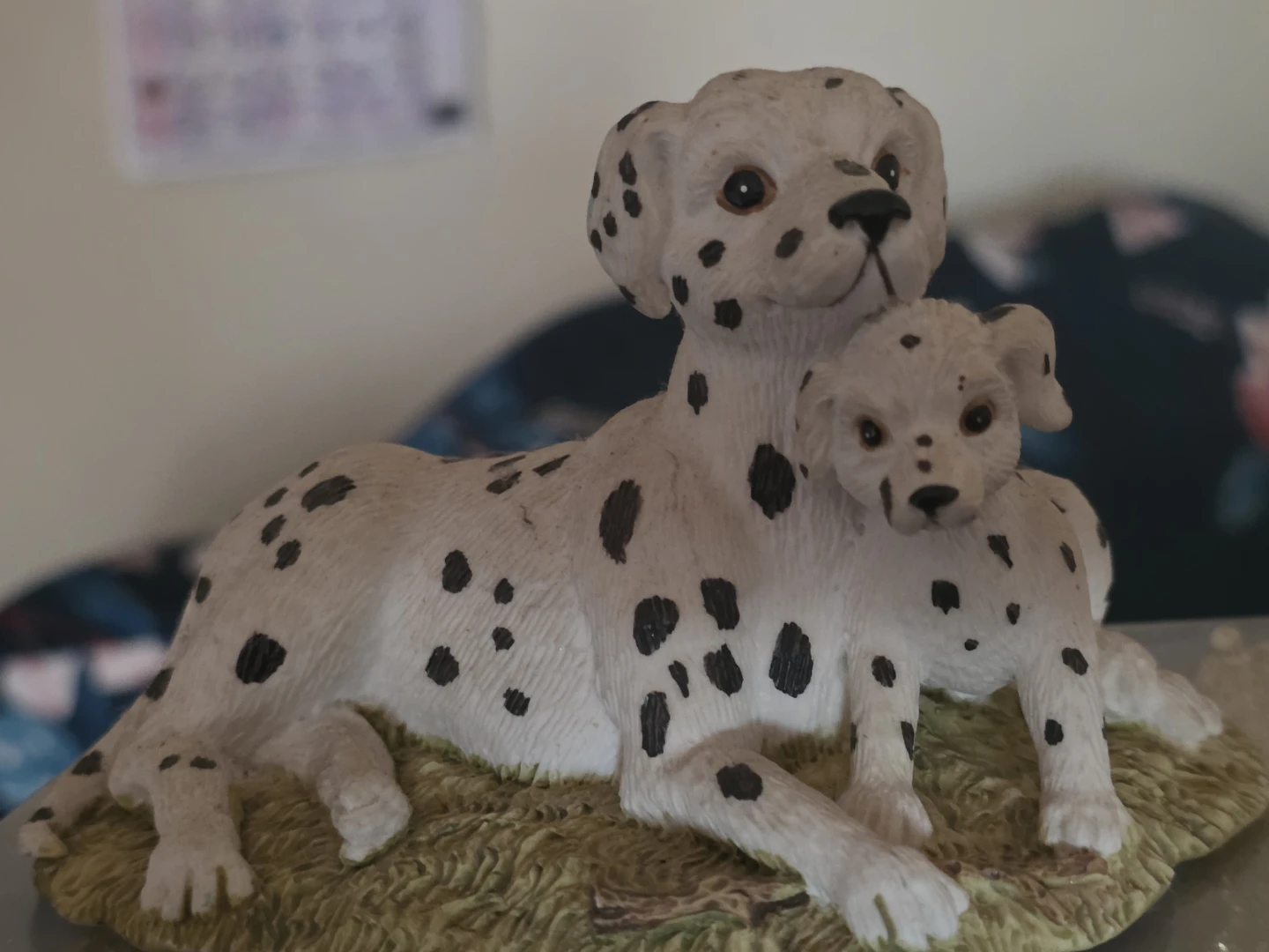 Dalmatian dog figurine with puppy