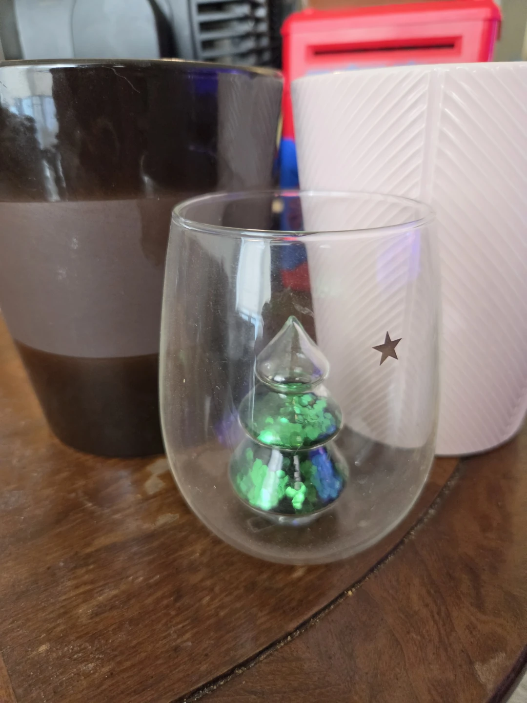 2 decorative planters and 1 Christmas tree glass decoration