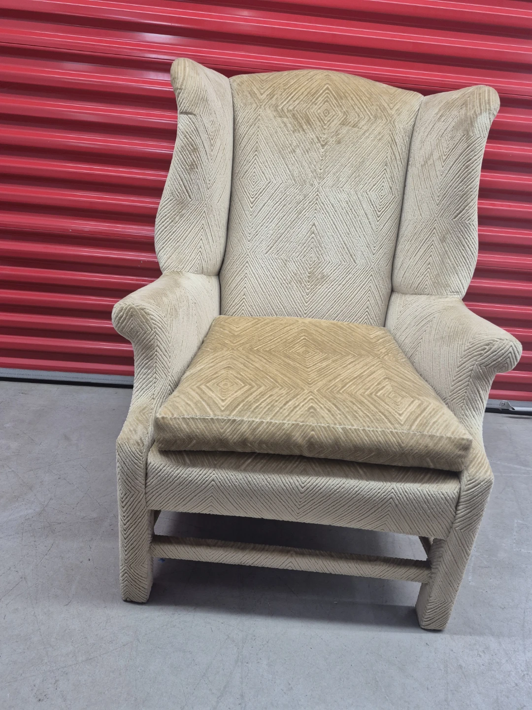 Beige Wingback Chair with Diamond Pattern