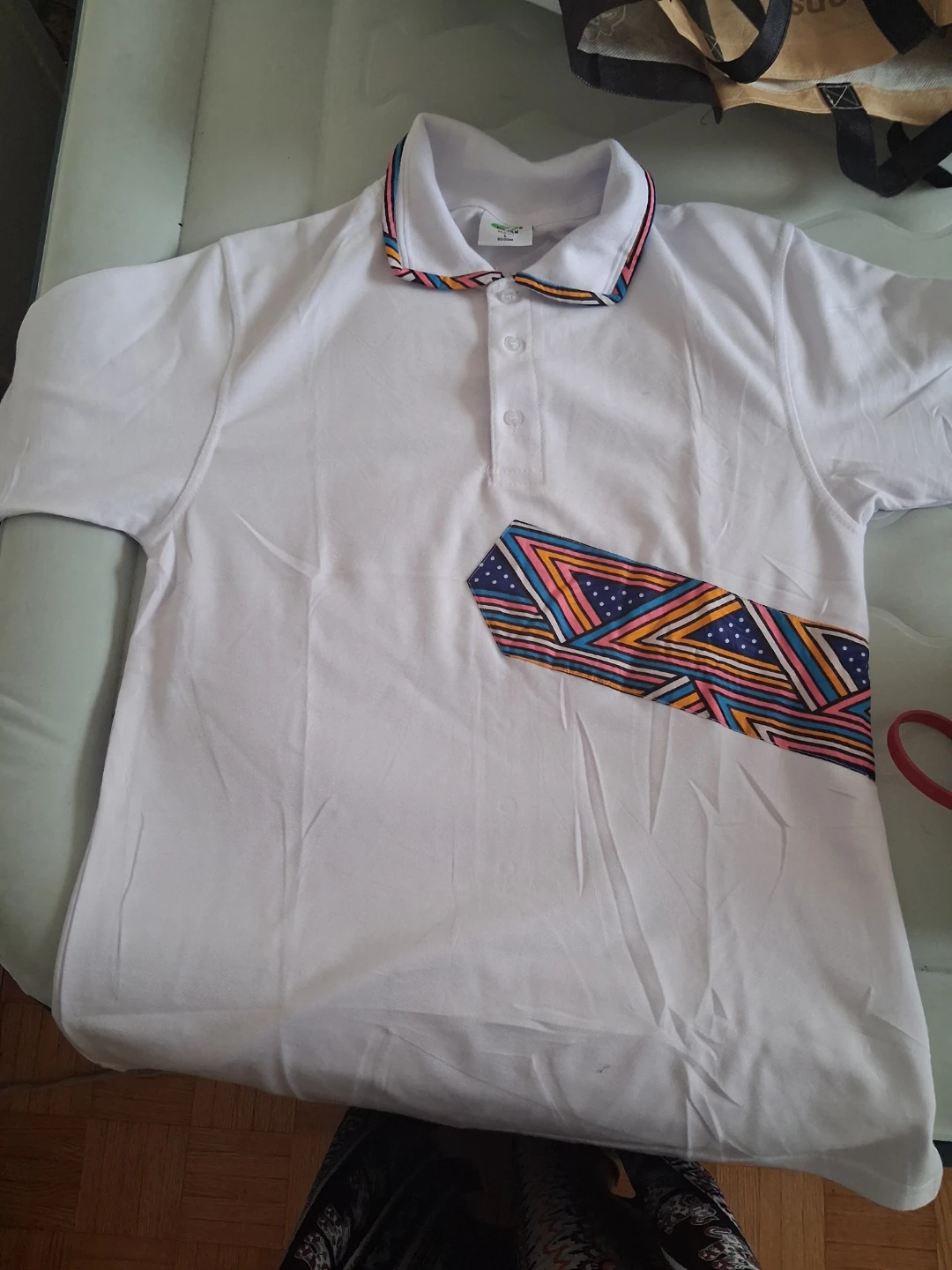 White Polo Shirt with Patterned Pocket and Collar