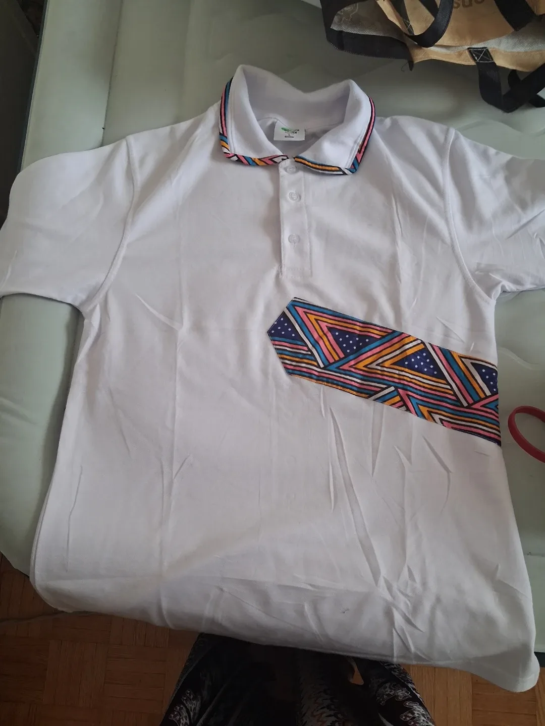 White Polo Shirt with Patterned Pocket and Collar