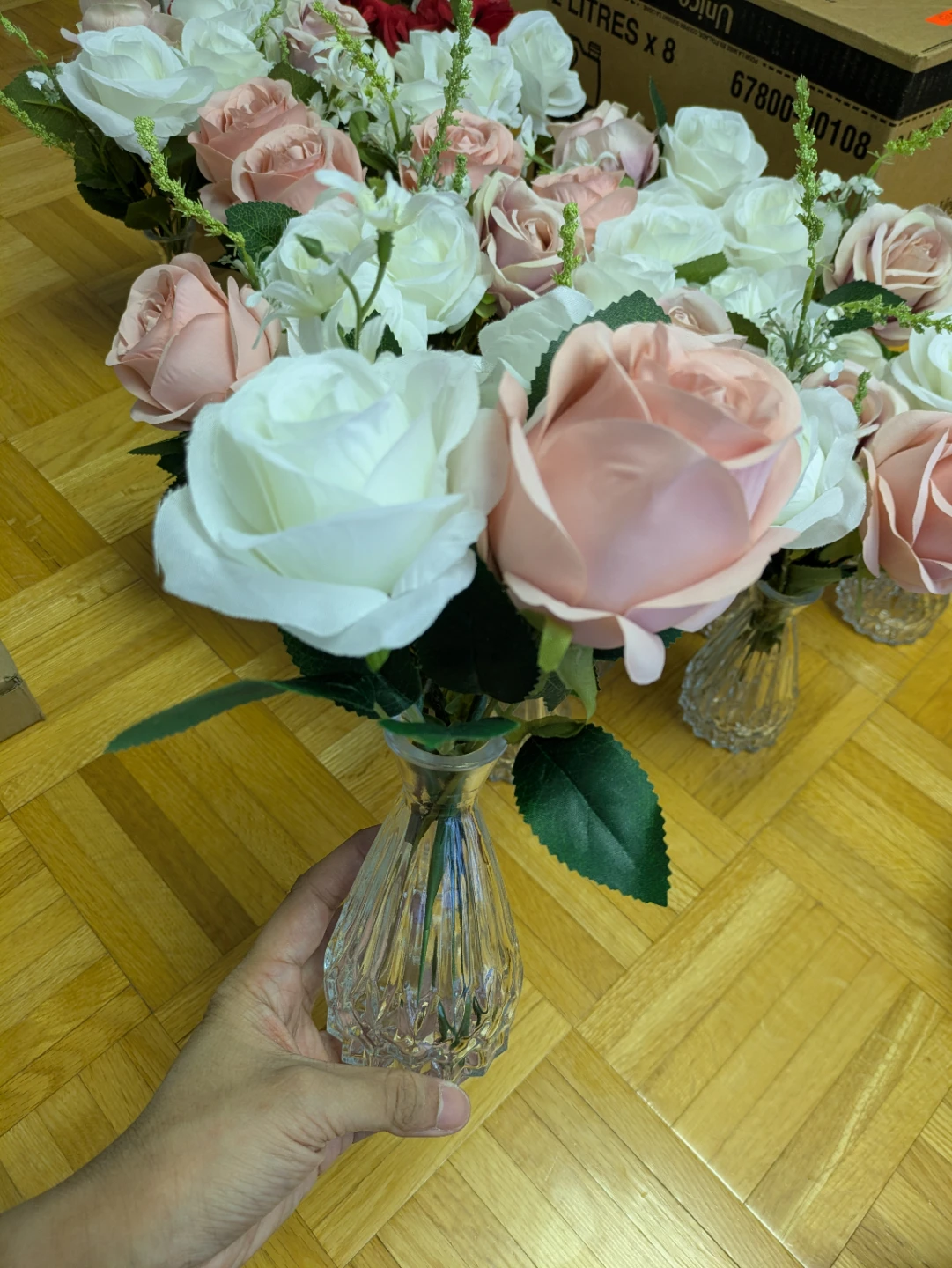 15 bud vases with flowers