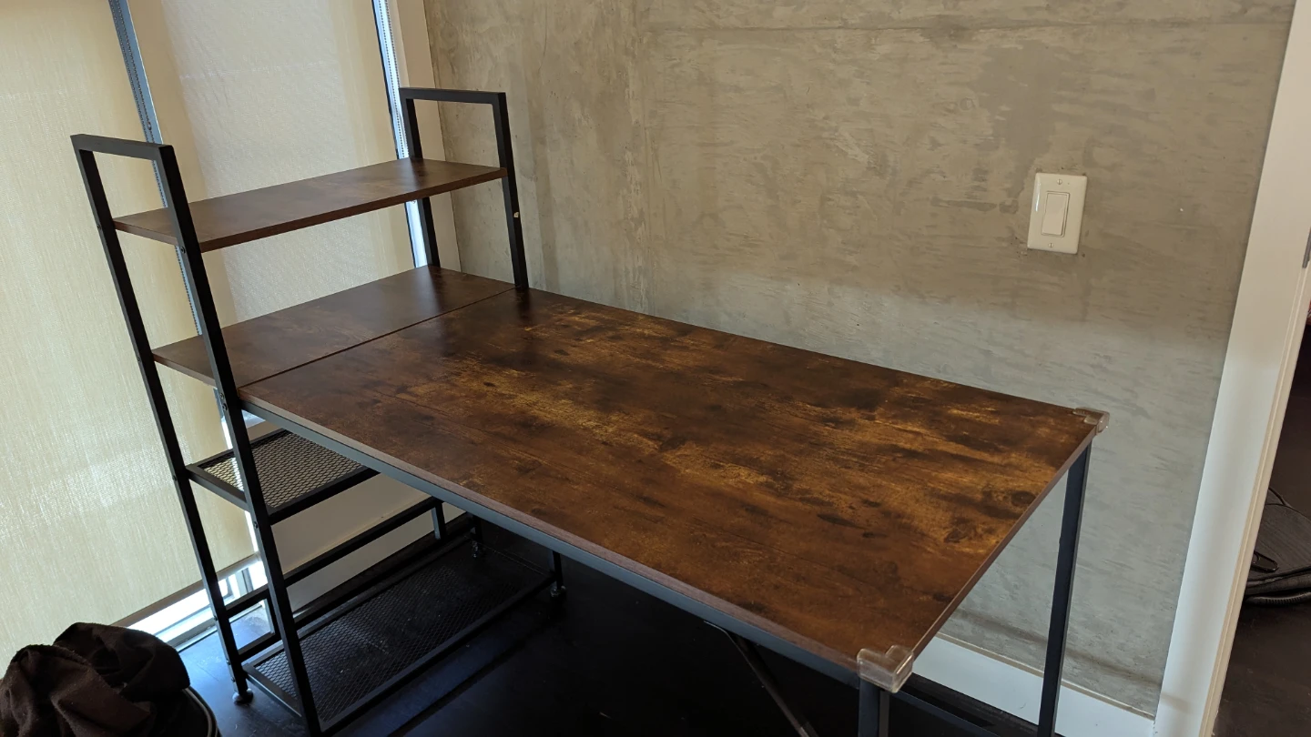 Desk with shelving 55 inches length.