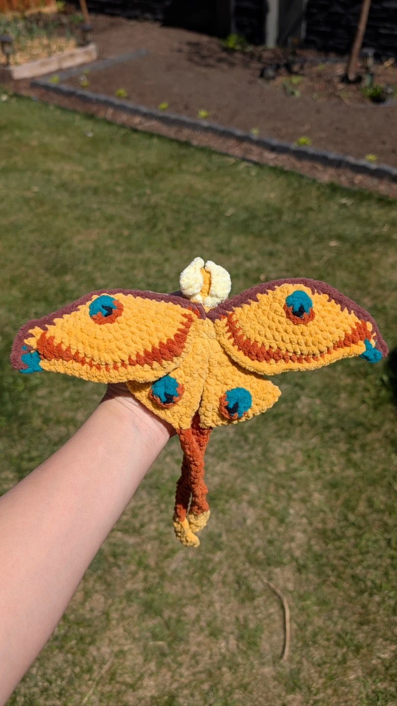 Crocheted comet Moth Plushie