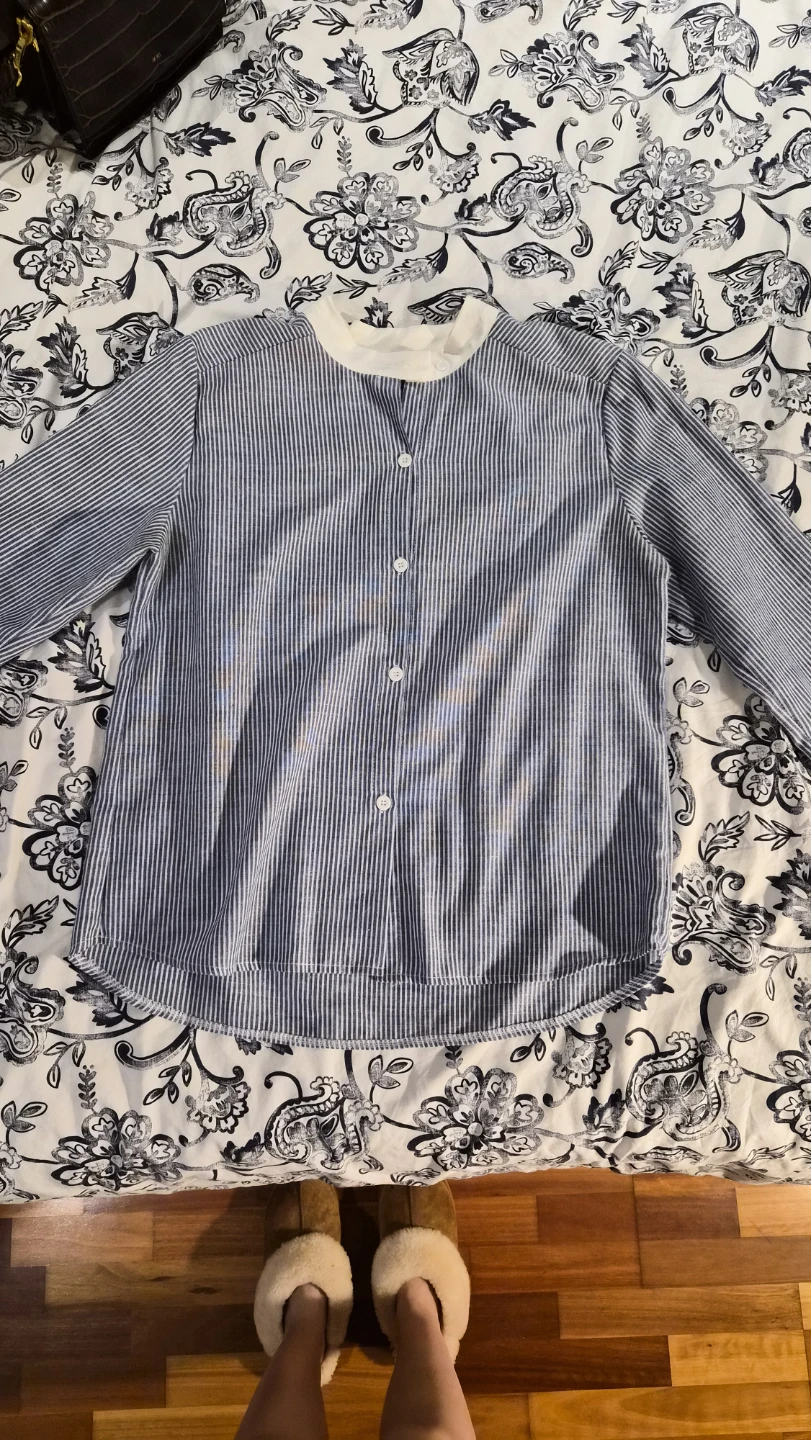 Blue and white pinstripe long-sleeve top