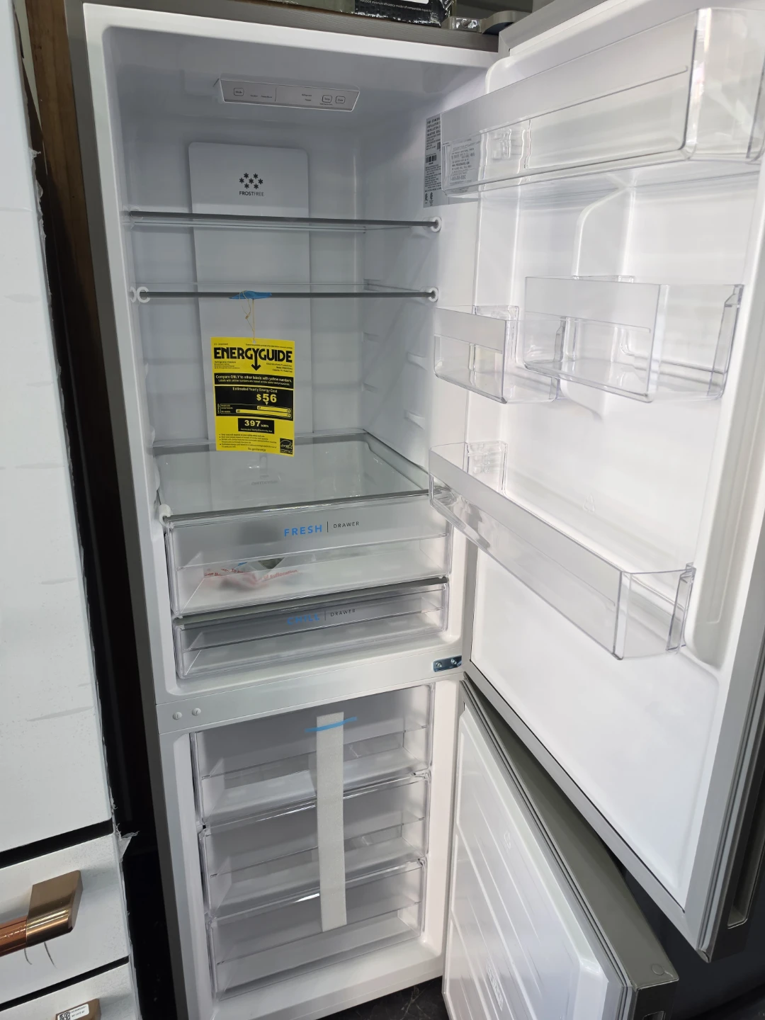 New Frigidaire 24in wide Stainless bottom freezer fridge - photo 2
