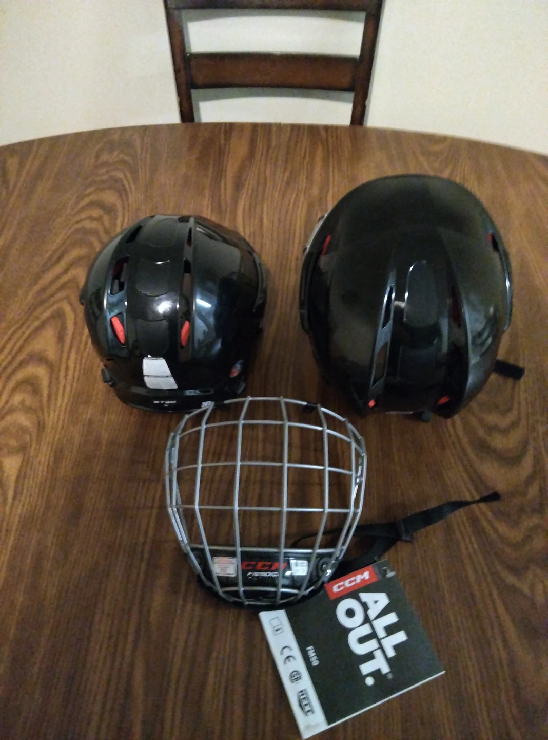 Two CCM Ice Hockey Helmets with Cages (2) - photo 2