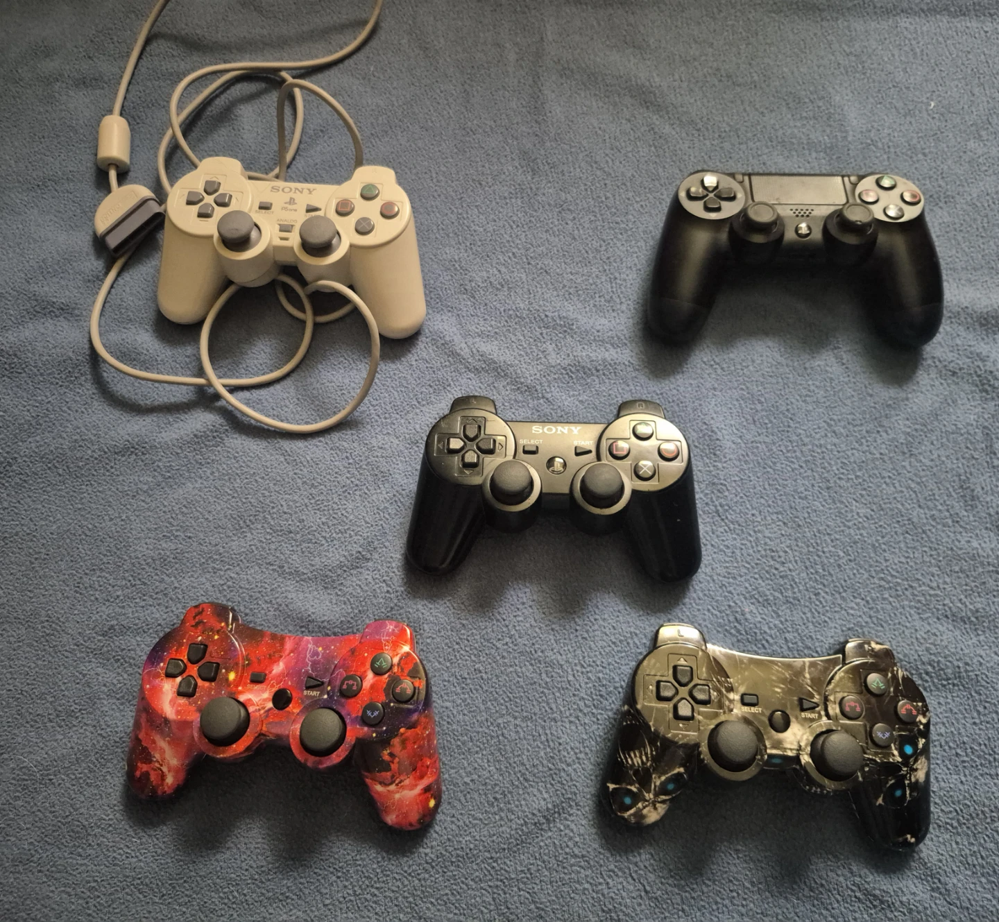PlayStation Controllers - 4 Total (Ps1, Ps3, Ps4)