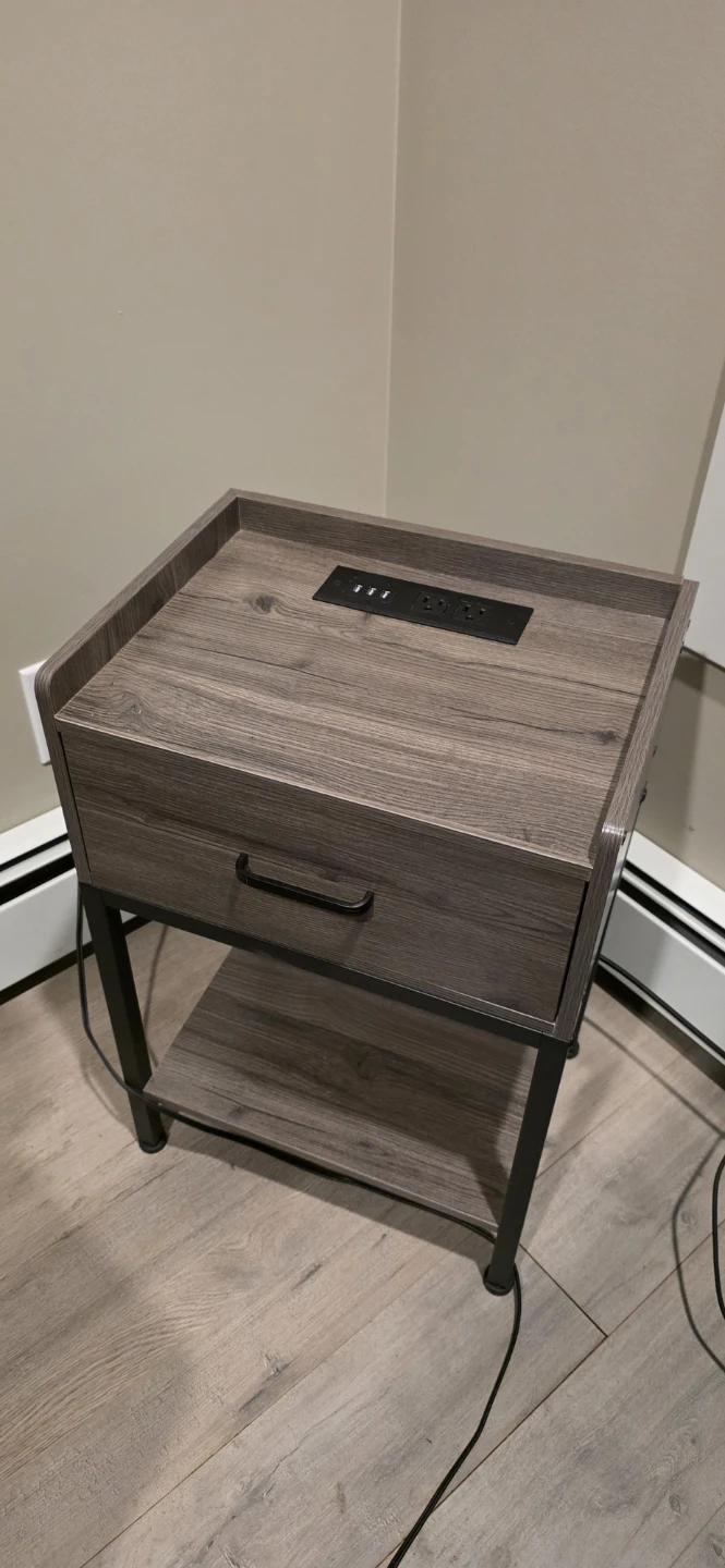 Bedside table with power outlets