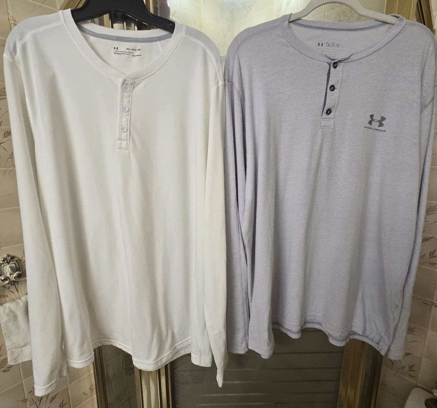 2 Under Armour Men's 2XL 3 button long sleeve Henleys.