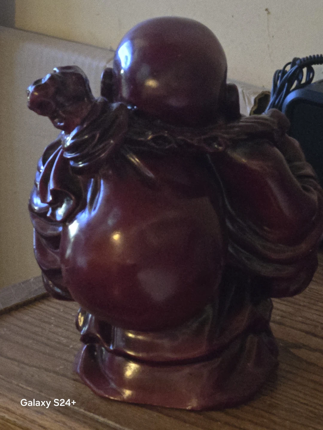 Red Laughing Buddha Statue