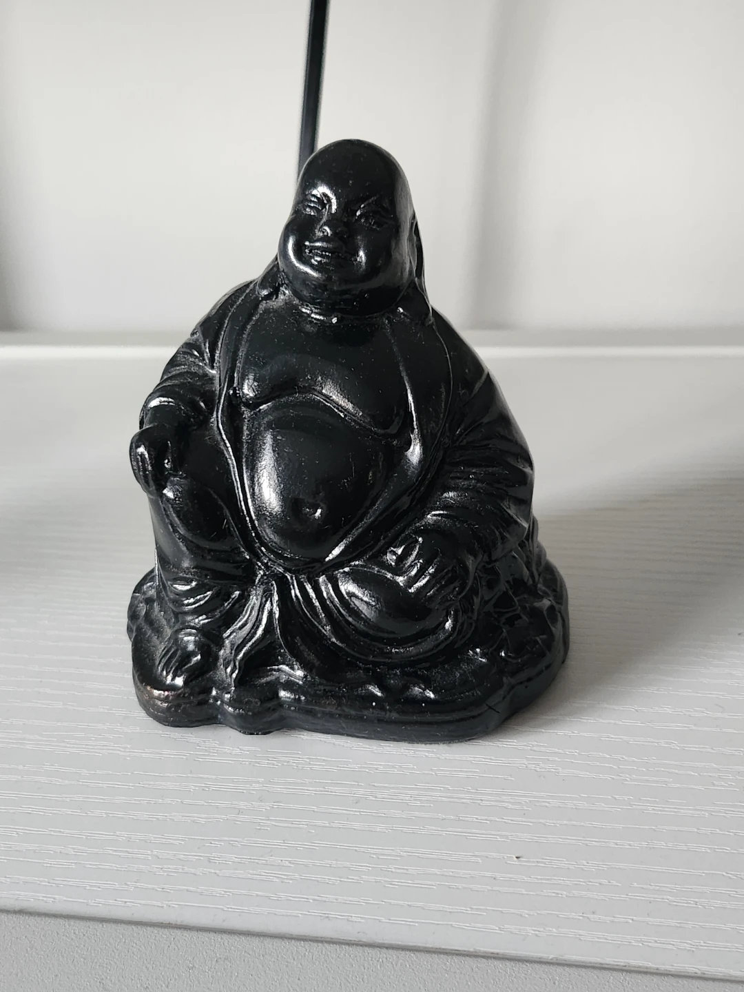 Black Laughing Buddha Statue